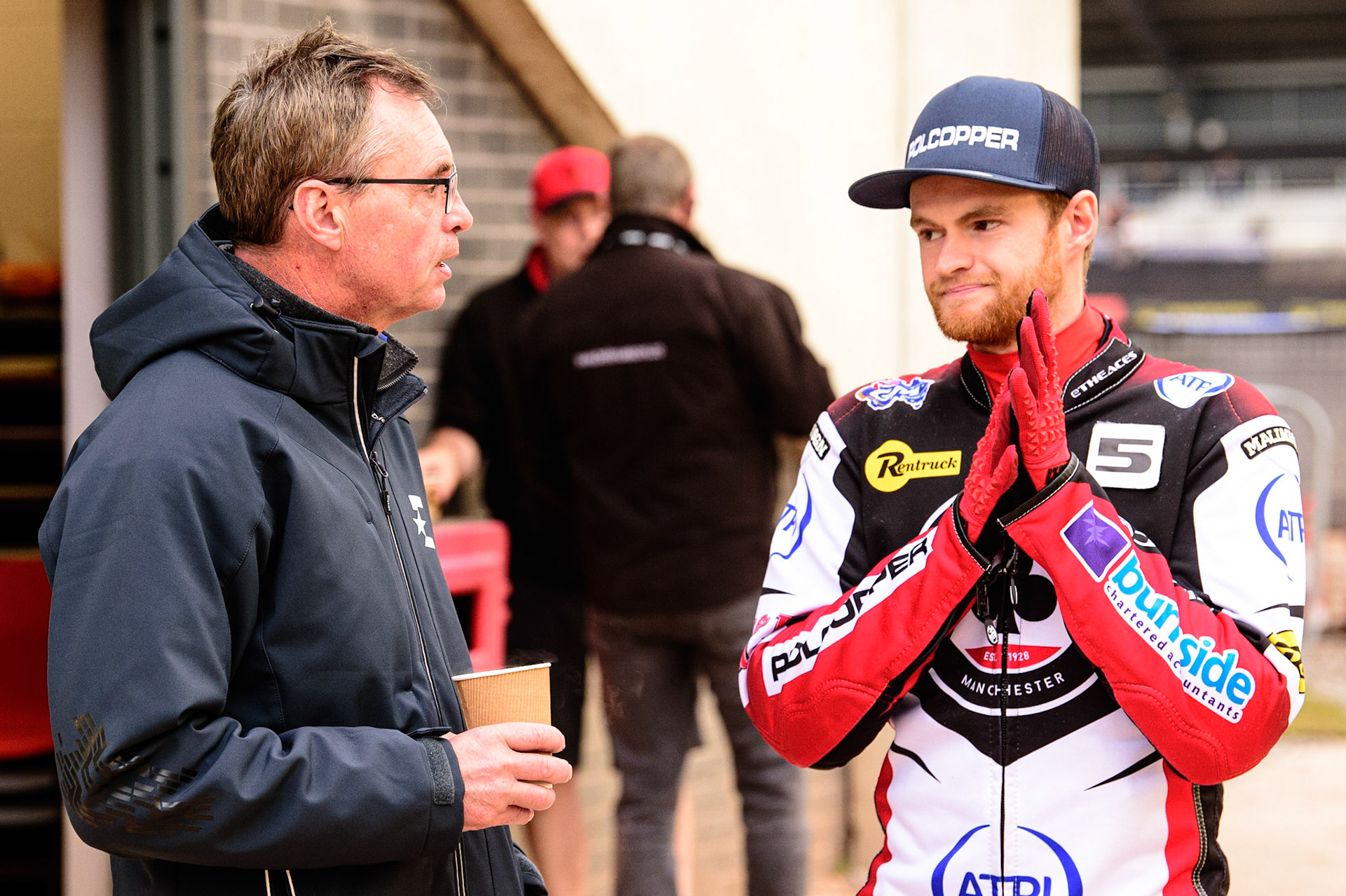 MANCHESTER, UK. JUN 6TH  Eurosport commentator Kelvin Tatum (left) chats with Belle Vue ATPI Aces captain Brady Kurtz during the SGB Premiership match between Belle Vue Aces and Ipswich Witches at the National Speedway Stadium, Manchester on Monday 6th June 2022. (Credit: Ian Charles | MI News)