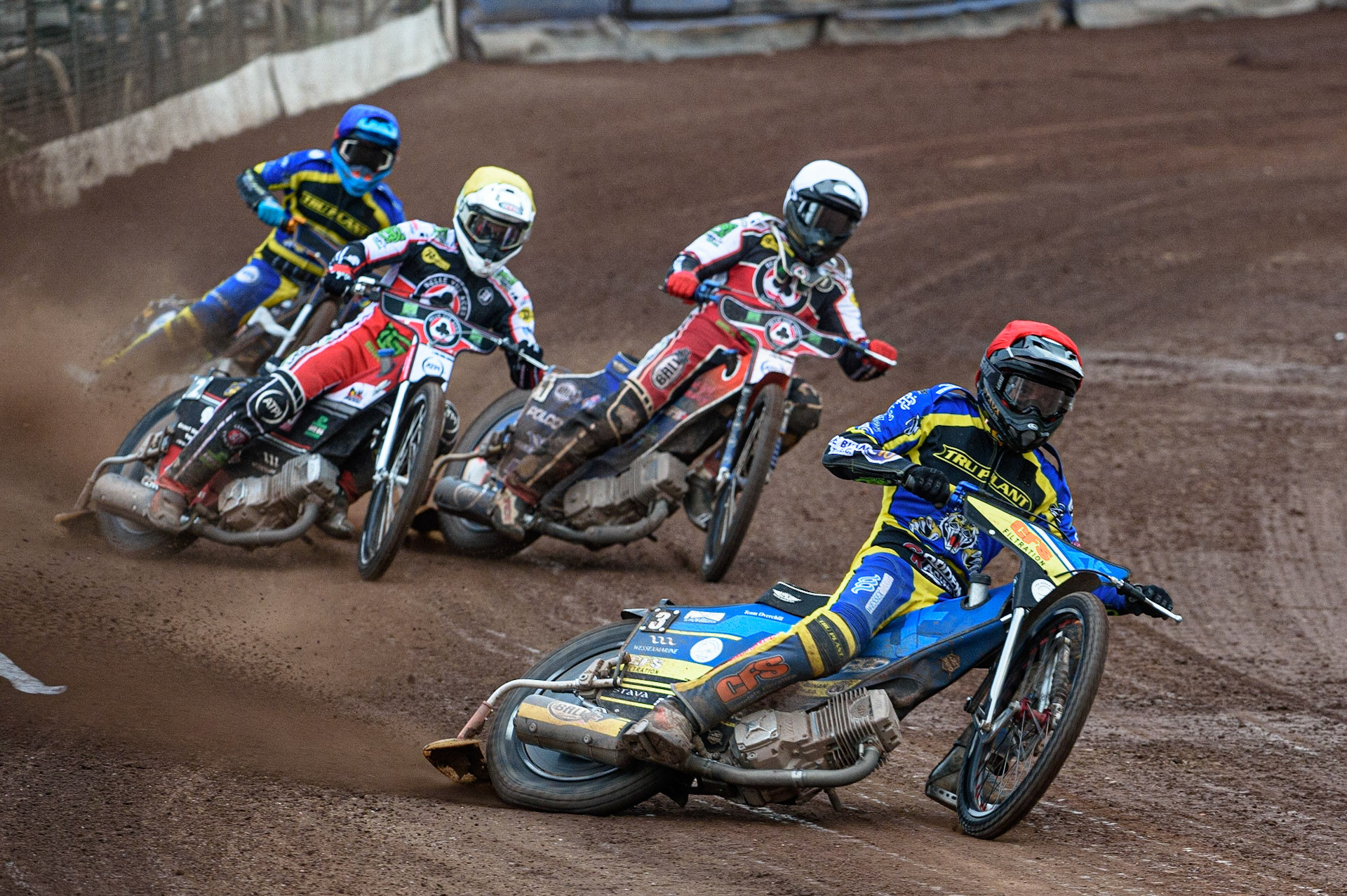 SHEFFIELD, UK. JULY 1ST     Adam Ellis  (Red) leads Brady Kurtz  (White) Richie Worrall  (Yellow) and Justin Sedgmen   (Blue) during the SGB Premiership match between Sheffield Tigers and Belle Vue Aces at Owlerton Stadium, Sheffield on Thursday 1st July 2021. (Credit: Ian Charles | MI News)