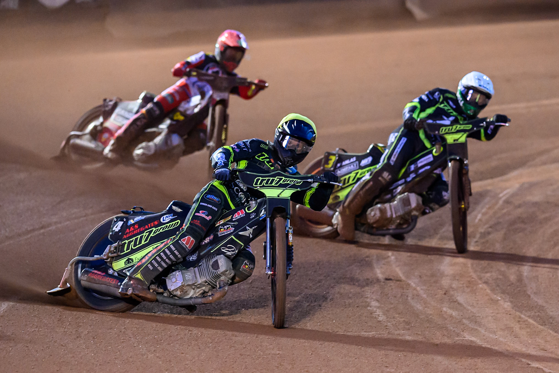 Dan Thompson of Ipswich Witches  in Yellow leading Jason Doyle of Ipswich Witches  in White and Jaimon Lidsey of Belle Vue Aces  in Red during the Rowe Motor Oil Premiership Play Off Semi Final 1 (1st Leg)  between Belle Vue Aces and Ipswich Witches at the National Speedway Stadium, Manchester on Monday 8th September 2025. (Photo: Ian Charles | MI News)