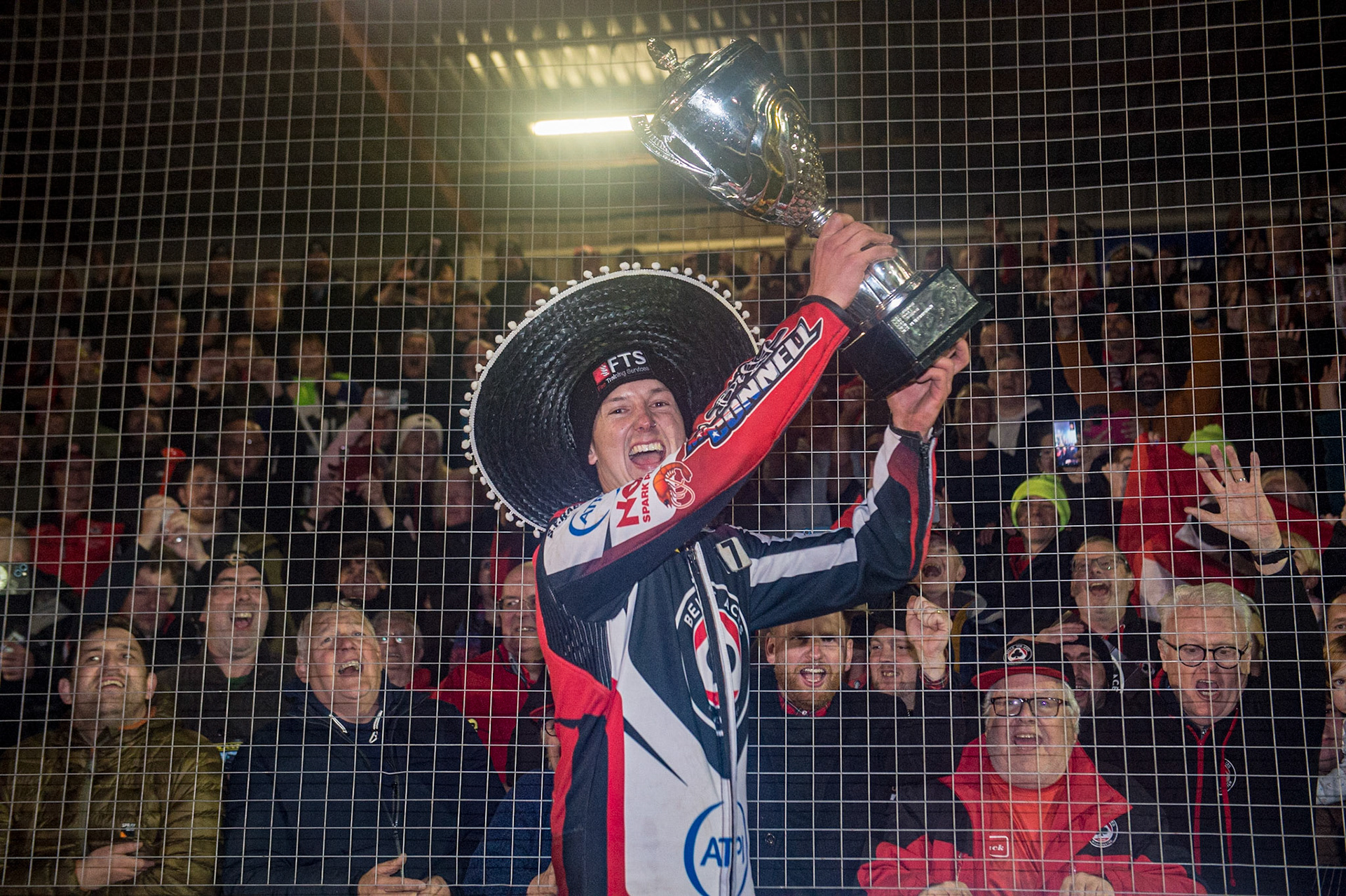 \jye Etheridge (who changed into a race suit for the presentation) with the trophy during the SGB Premiership Grand Final 2nd Leg between Sheffield Tigers and Belle Vue Aces at Owlerton Stadium, Sheffield on Thursday 13th October 2022. (Credit: Ian Charles | MI News)