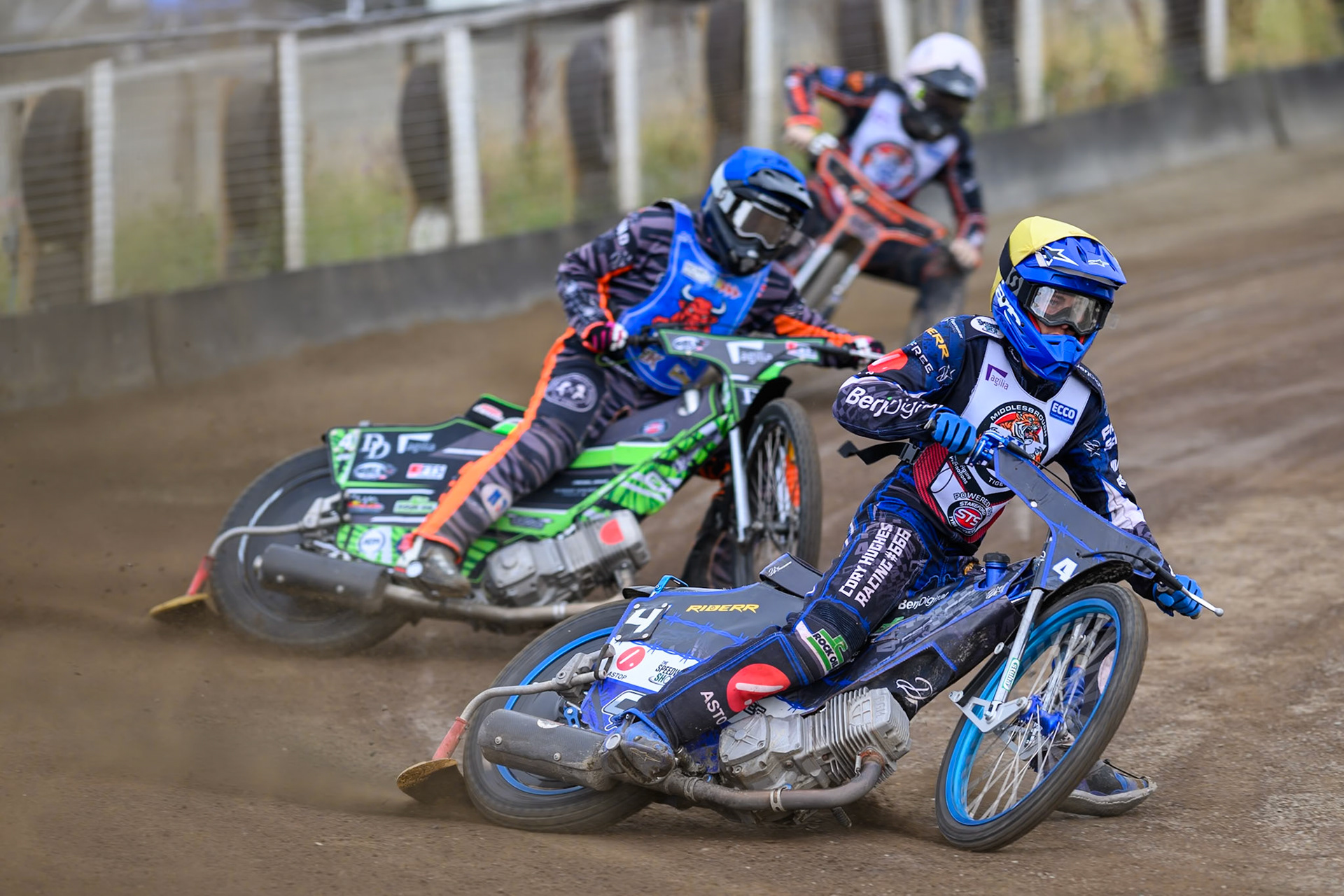 Charlie Southwick of Middlesborough Tigers in Yellow leading Jack Roberts of Buxton Bulls in Blue  and Harry Sadler of Middlesborough Tigers in White during the WSRA National Development League match  between Buxton Bulls and Middlesborough Tigers at Hi-Edge Speedway, Buxton on Sunday 16th August 2026. (Photo: Ian Charles | MI News)