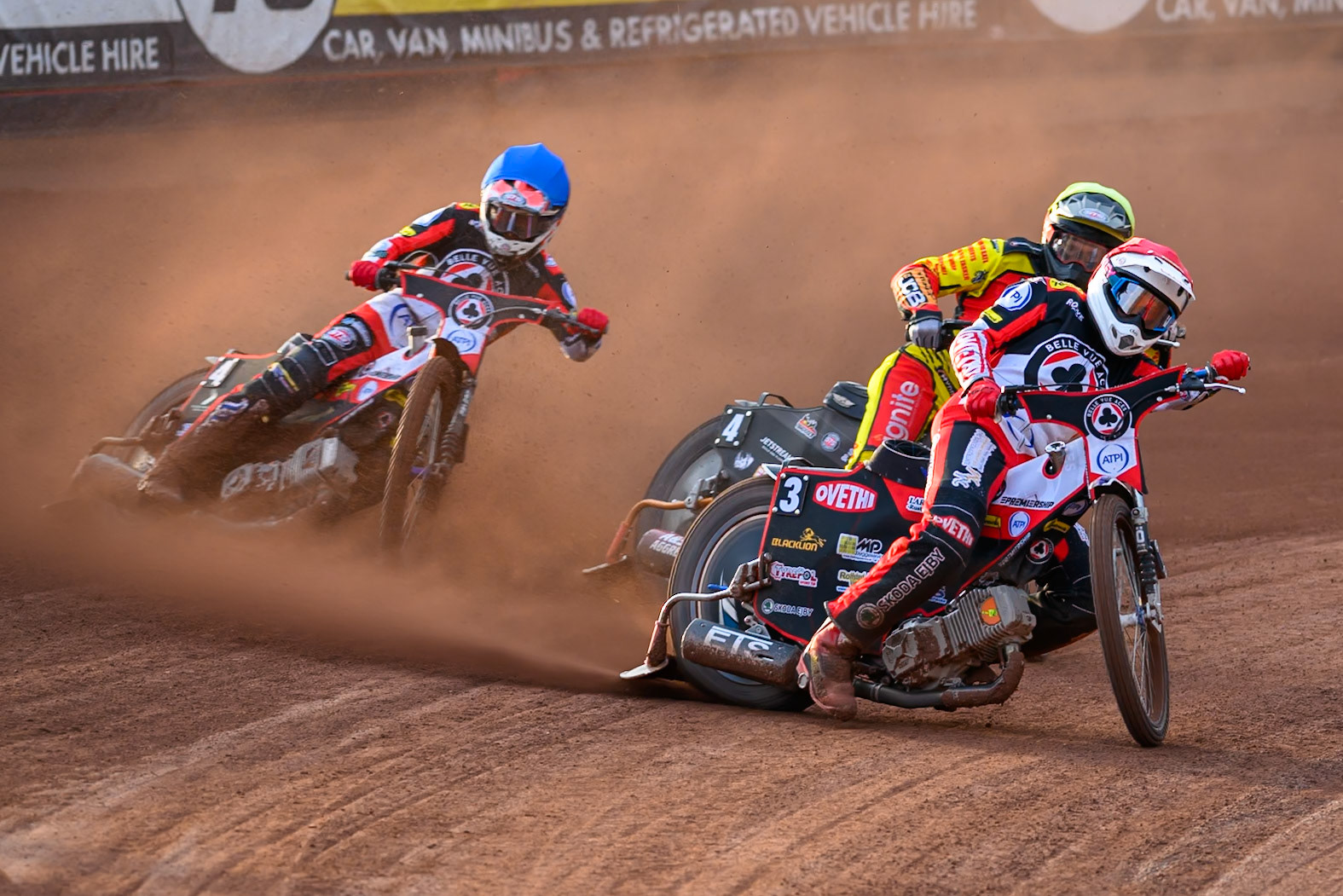 Peter Kildemand of Belle Vue Aces in Red leading Dan Thompson of Leicester Lions in Yellow Zach Cook of Belle Vue Aces in Blue during the Rowe Motor Oil Premiership match between Belle Vue Aces and Leicester Lions at the National Speedway Stadium, Manchester on Monday 3rd August 2026. (Photo: Ian Charles | MI News)