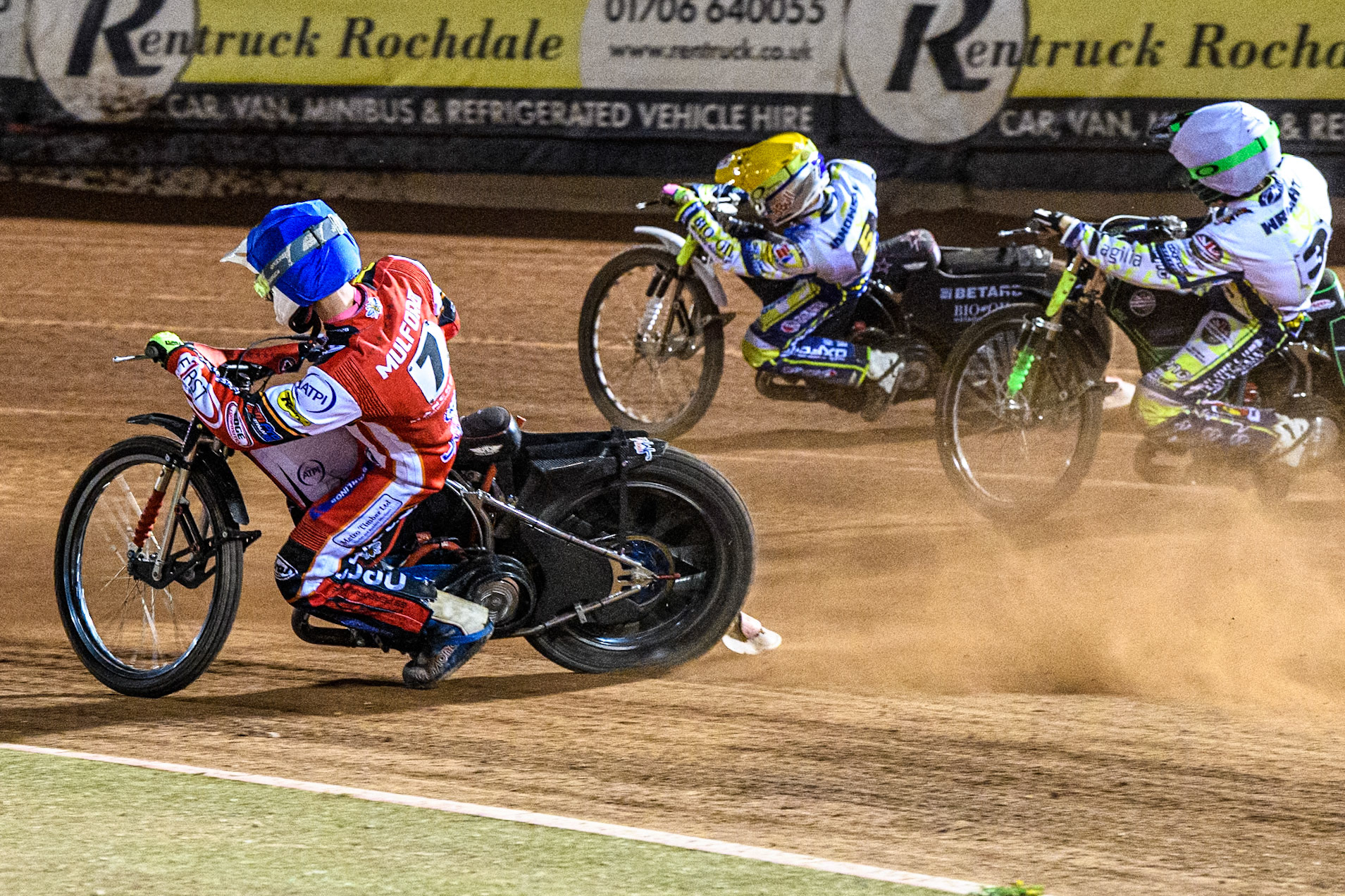 Belle Vue Aces' Jake Mulford in Blue rides inside Oxford Spires' Maciej Janowski in Yellow and Oxford Spires' Charles Wright in White during the Rowe Motor Oil Premiership match between Belle Vue Aces and Oxford Spires at the National Speedway Stadium, Manchester on Monday 14th April 2025. (Photo: Ian Charles | MI News)