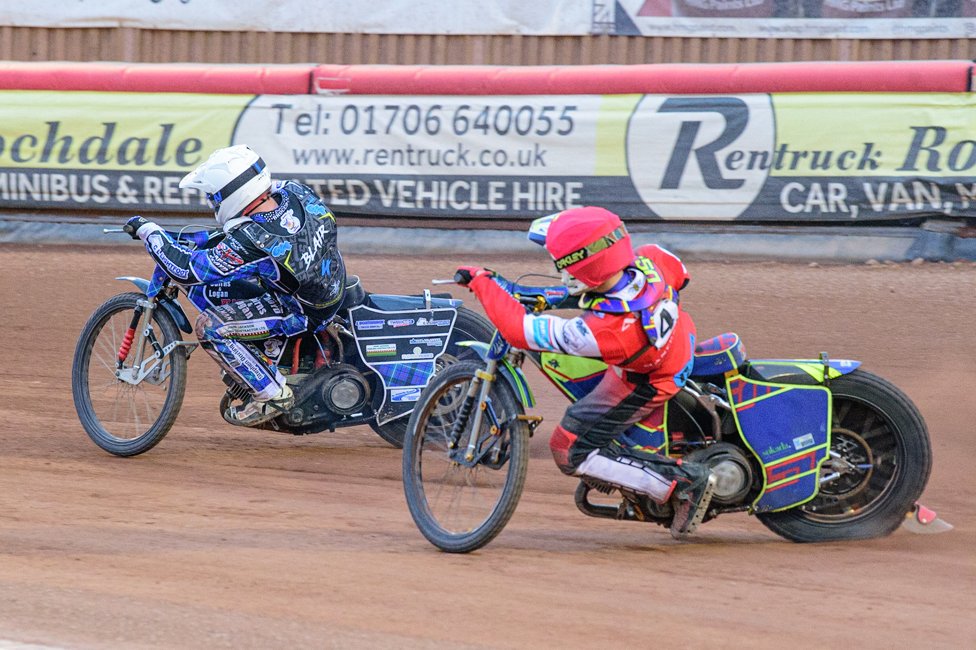 MANCHESTER, UK. JUN 24TH  Nathan Ablitt  (Red) chases Greg Blair  (White) during the National Development League match between Belle Vue Colts and Berwick Bullets at the National Speedway Stadium, Manchester on Friday 24th June 2022. (Credit: Ian Charles | MI News)