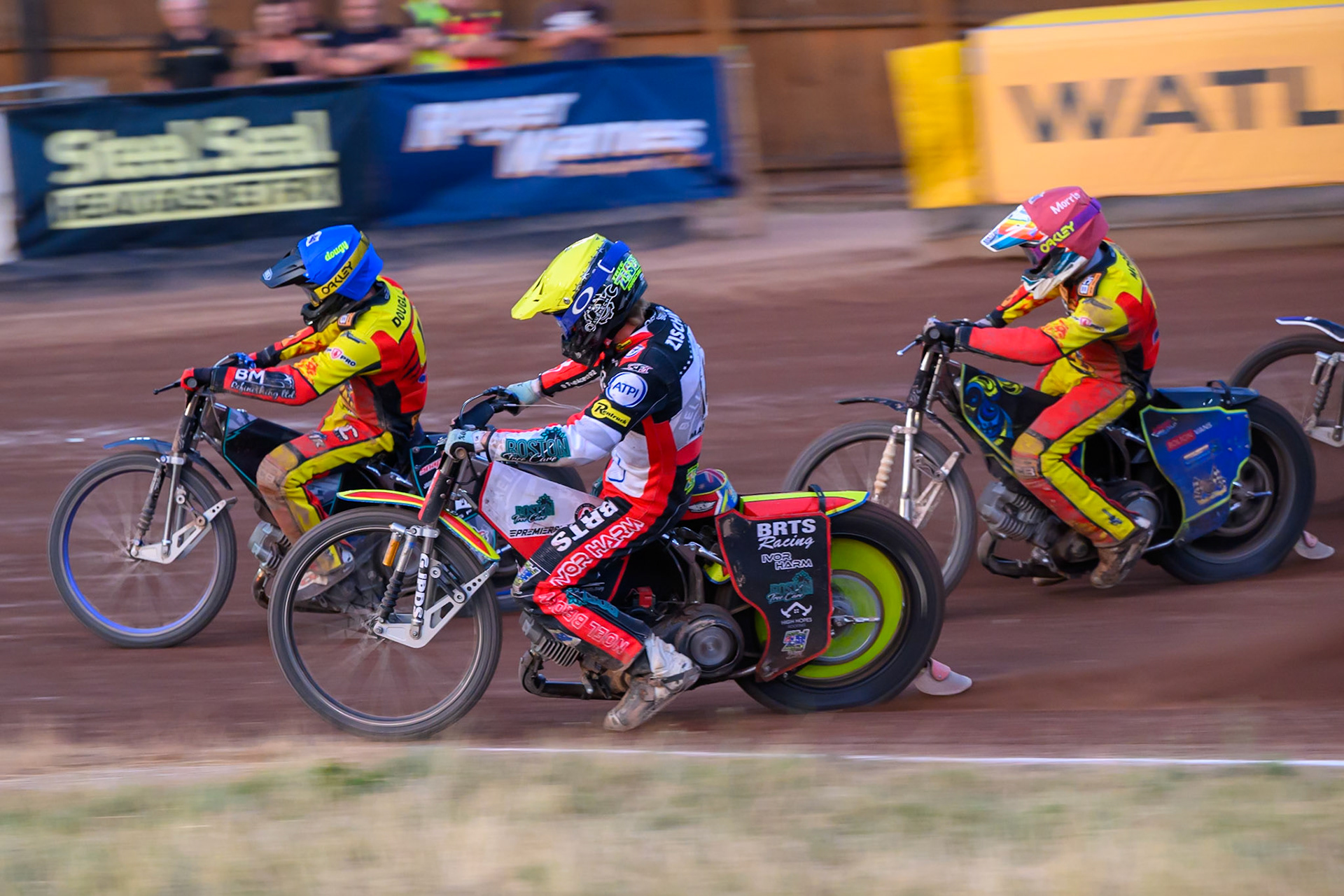 Tate Zischke of Belle Vue Aces in Yellow rides inside Ryan Douglas of Leicester Lions in Blue and Nick Morris of Leicester Lions  in Red during the Rowe Motor Oil Premiership match between Leicester Lions and Belle Vue Aces at the Hydroscan Arena, Leicester on Thursday 23rd July 2026. (Photo: Ian Charles | MI News)