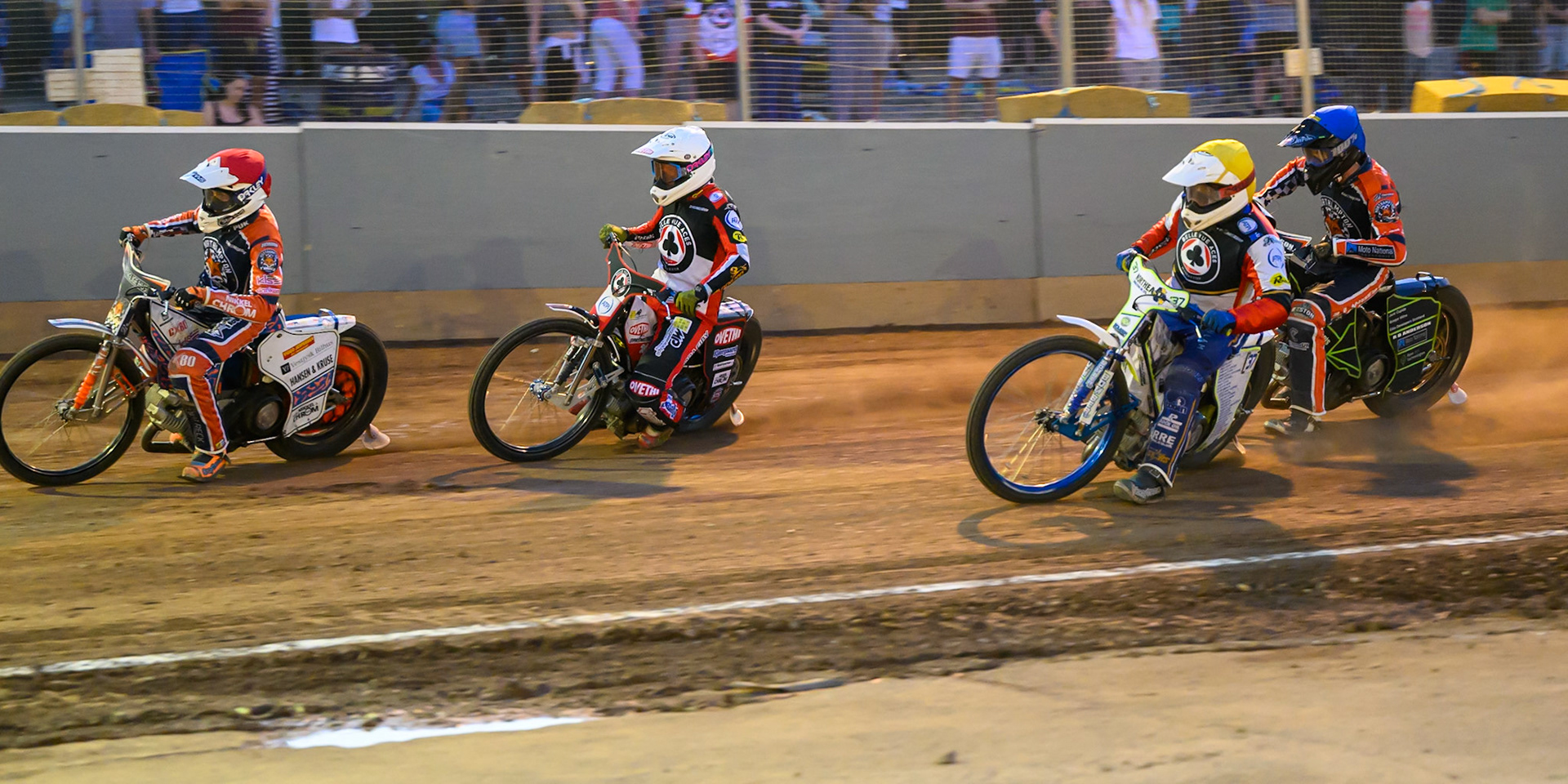 Niels-Kristian Iversen of Northampton Foxes  in Red leading Peter Kildemand of Belle Vue Aces  in White , Chris Harris Guest Rider for Belle Vue Aces in Yellow  and Kye Thomson of Northampton Foxes in Blue during the Rowe Motor Oil Premiership match between Northampton Foxes and Belle Vue Aces at Northampton International Shaleway, Northampton on Thursday 13th August 2026. (Photo: Ian Charles | MI News)