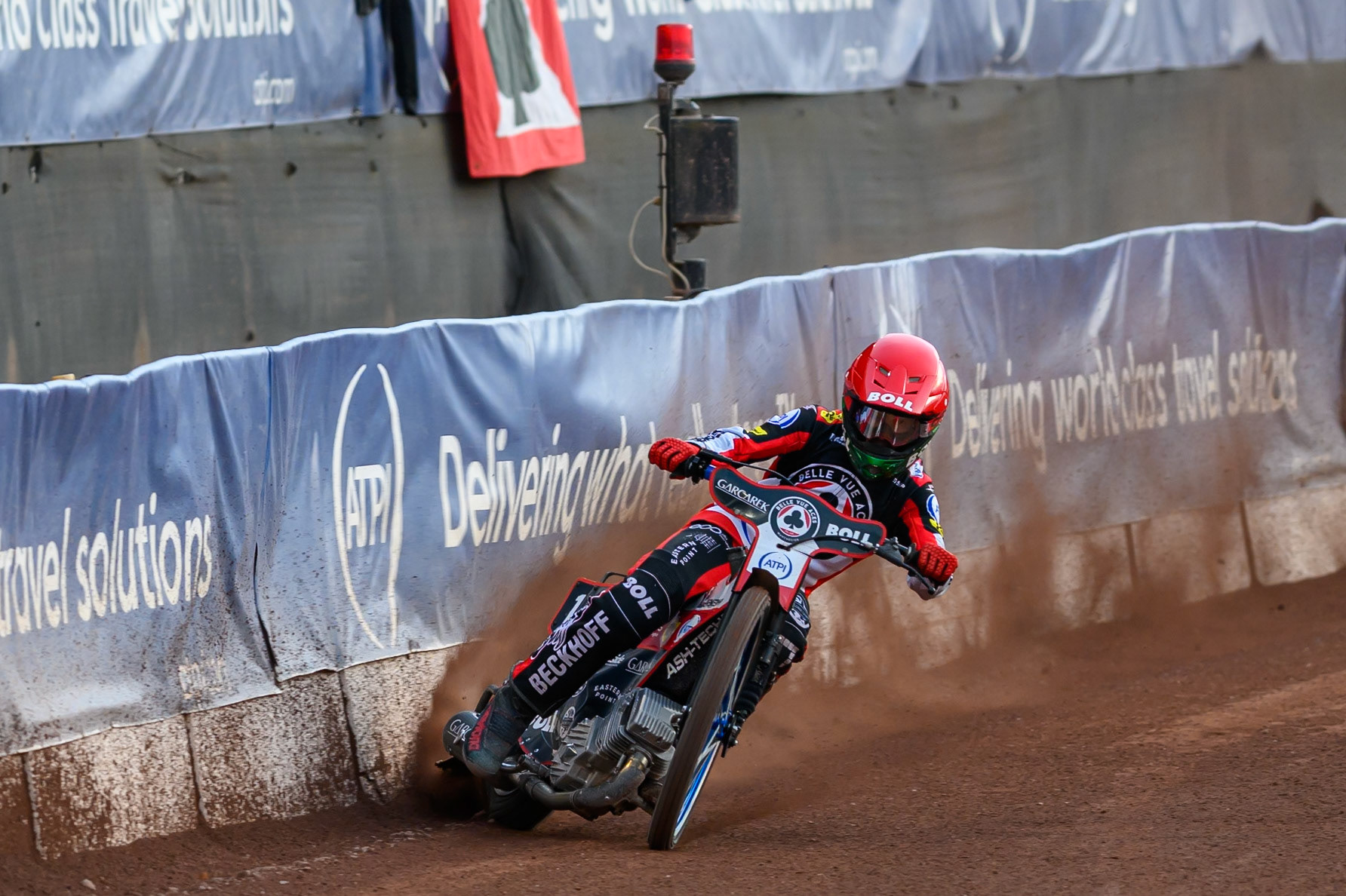 Brady Kurtz of Belle Vue Aces gets some drive from the build up of shale by the safety fence during the Rowe Motor Oil Premiership match between Belle Vue Aces and Leicester Lions at the National Speedway Stadium, Manchester on Monday 3rd August 2026. (Photo: Ian Charles | MI News)