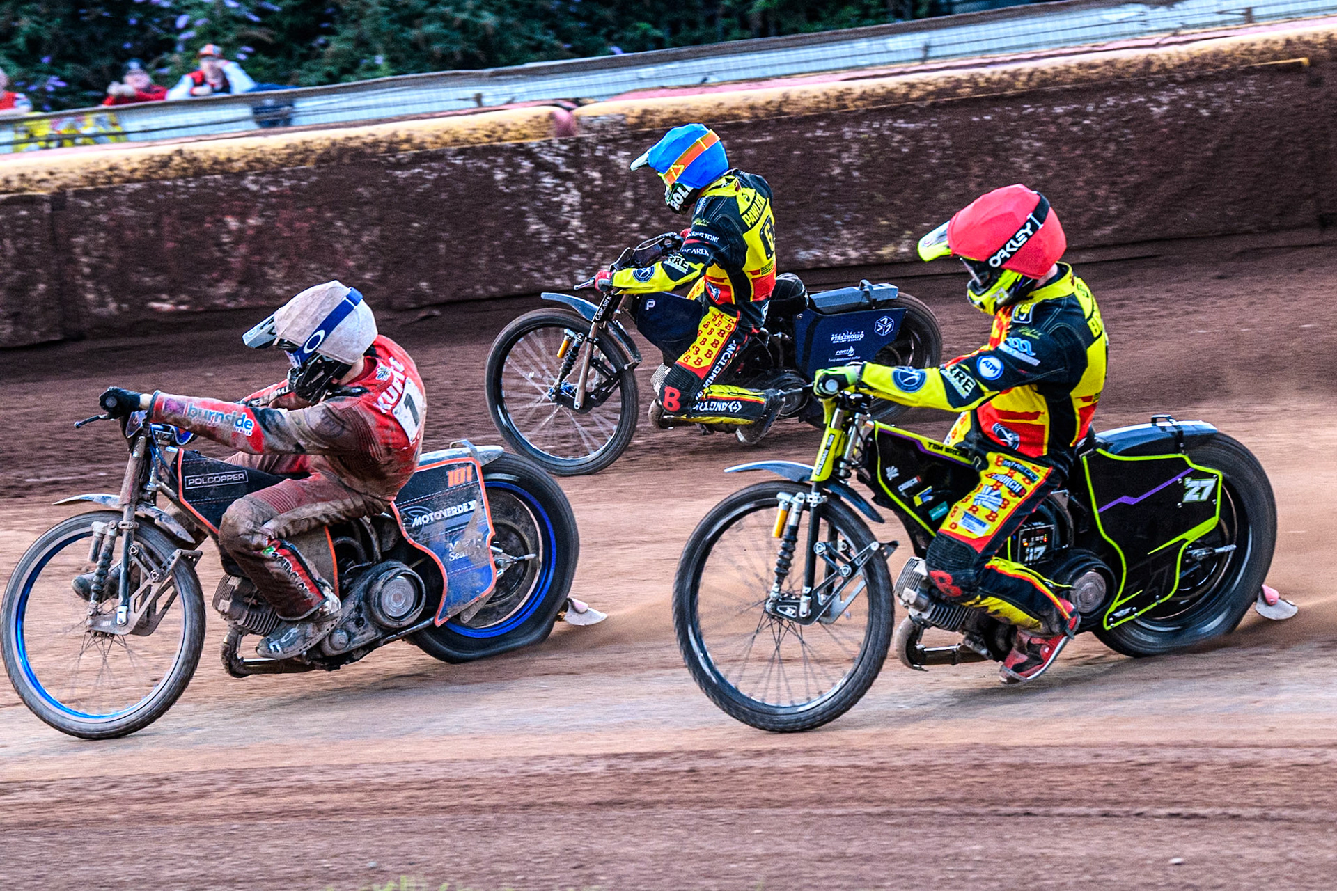 Birmingham Brummies' Tom Brennan in Red rides inside Birmingham Brummies' Piotr Pawlicki in Blue and Belle Vue Aces' Brady Kurtz in White during the Rowe Motor Oil Premiership match between Birmingham Brummies and Belle Vue Aces at Perry Bar Stadium, Birmingham on Monday 29th July 2024. (Photo: Ian Charles | MI News)
