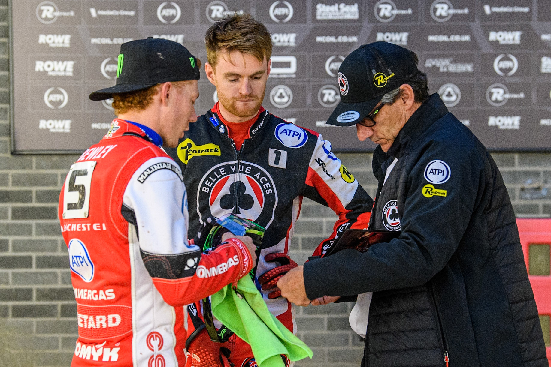 Belle Vue Aces' Team Manager Mark Lemon  (Right) with Belle Vue Aces' Brady Kurtz  (Centre) and Belle Vue Aces' Dan Bewley  (Left) during the Rowe Motor Oil Premiership match between Belle Vue Aces and Oxford Spires at the National Speedway Stadium, Manchester on Monday 22nd July 2024. (Photo: Ian Charles | MI News)
