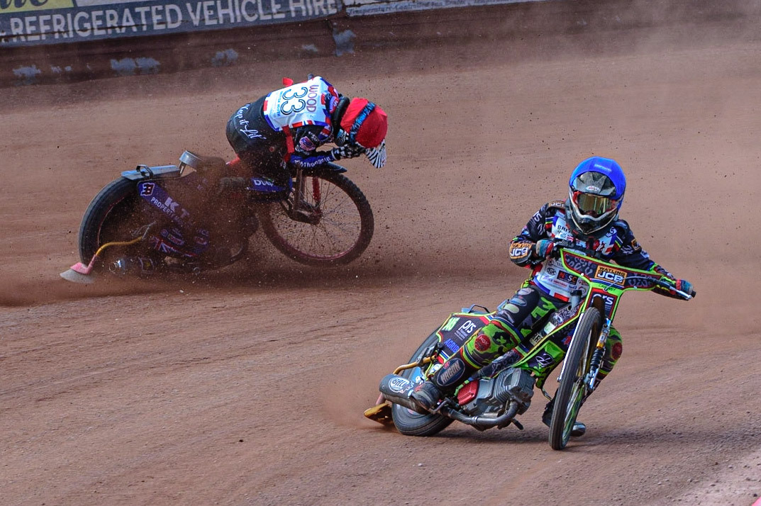 MANCHESTER, UK. JUN 3RD Charlie Wood (33) (Red) crashes behind William Cairns (145)  (Blue) during the British Youth Speedway Championship (Round 4)  at the National Speedway Stadium, Manchester on Friday 3rd June 2022. (Credit: Ian Charles | MI News)