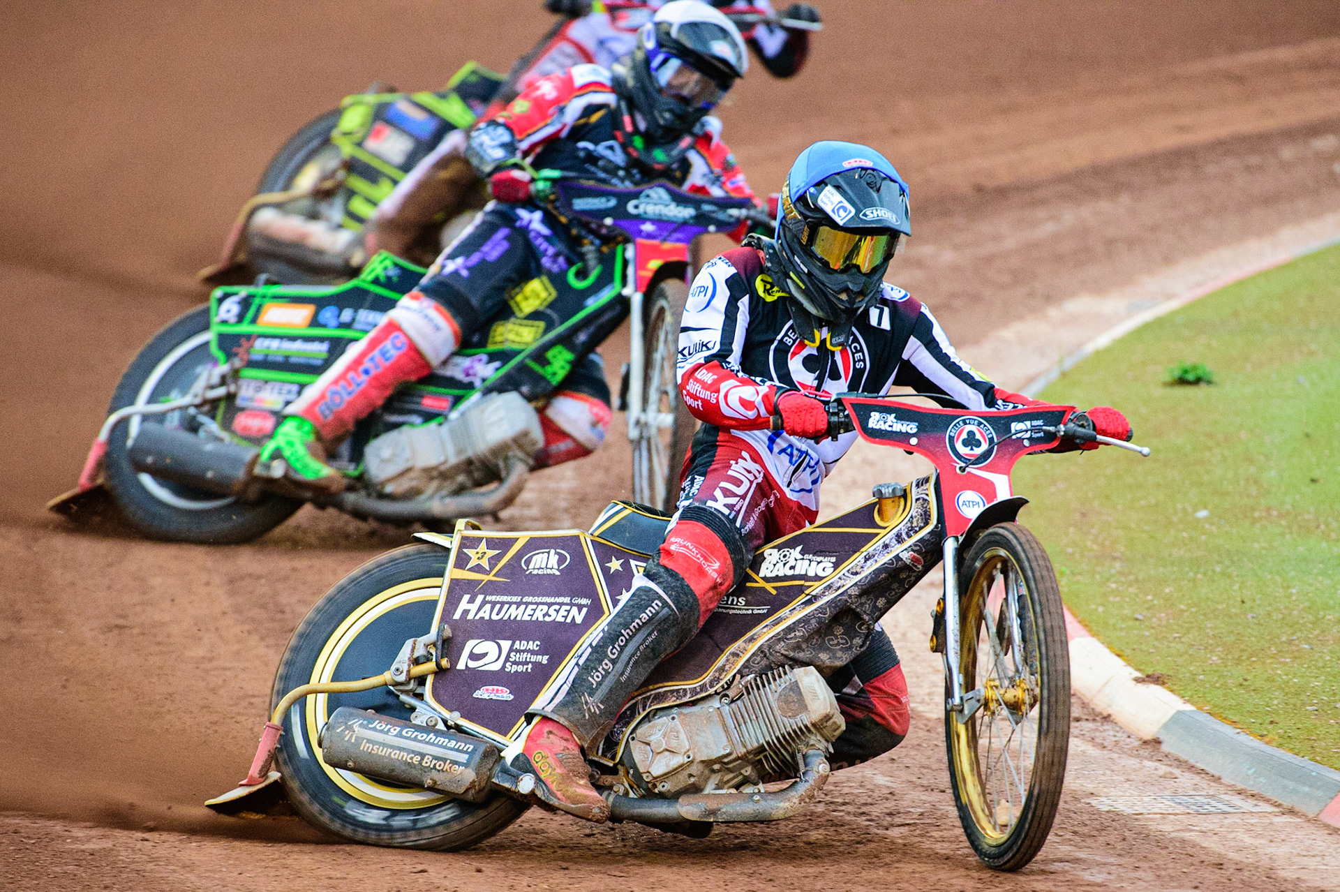 Norick Blödorn  (Blue) leads Benjamin Basso  (White) during the SGB Premiership match between Belle Vue Aces and Peterborough at the National Speedway Stadium, Manchester on Monday 25th July 2022. (Credit: Ian Charles | MI News