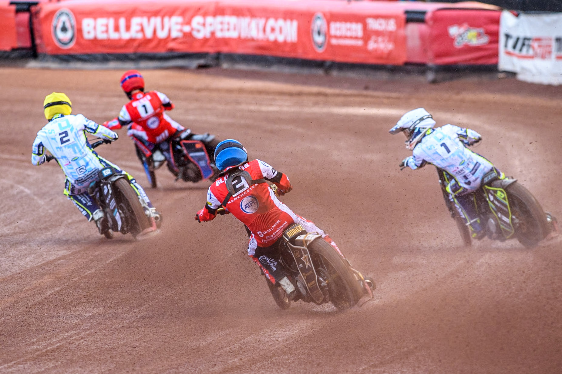Belle Vue Aces' Norick Blodorn in Blue chases Oxford Spires' Rohan Tungate in White, Oxford Spires' Erik Riss in Yellow and Belle Vue Aces' Brady Kurtz in Red during the Rowe Motor Oil Premiership match between Belle Vue Aces and Oxford Spires at the National Speedway Stadium, Manchester on Monday 13th May 2024. (Photo: Ian Charles | MI News)