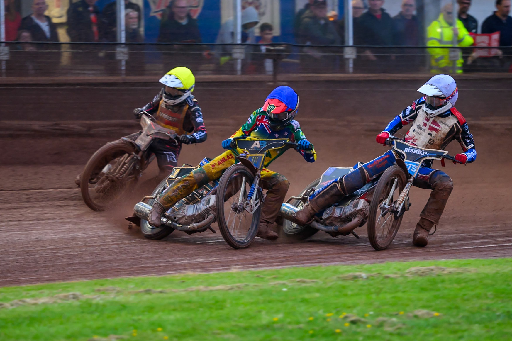 Jack Holder of Australia in Blue leading Kai Huckenbeck of Germany in Yellow and Frederik Jacobsen of Denmark in White during the Speedway GP Qualifying Round 3 at Allied Ashfield Stadium, Glasgow on Saturday 30th May 2026. (Photo: Ian Charles | MI News)