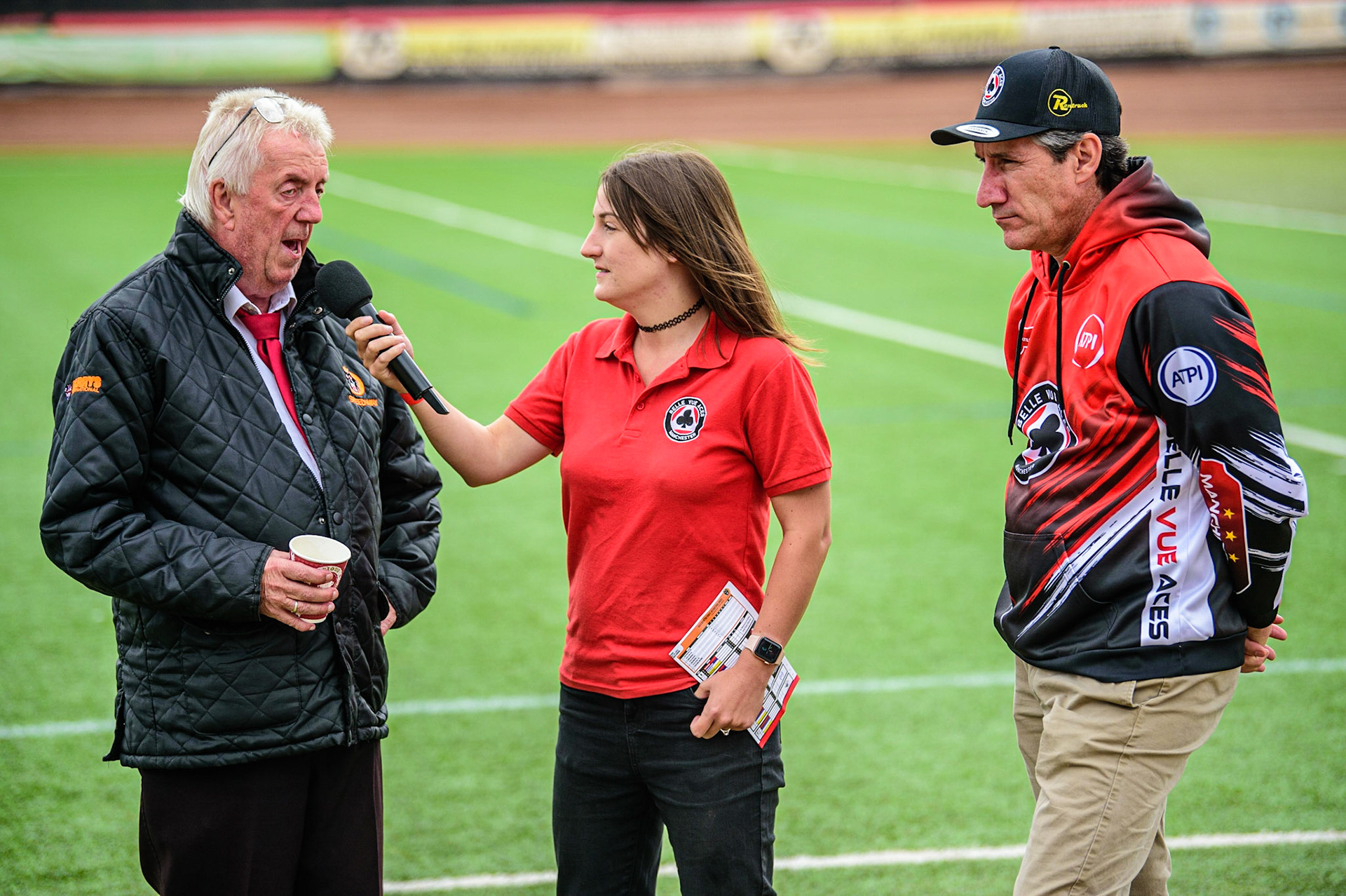 Peter Adams (left) ism interviewed by Hayley Bromley with Mark Lemon (right) during the SGB Premiership match between Belle Vue Aces and Wolverhampton Wolves at the National Speedway Stadium, Manchester on Monday 29th August 2022. (Credit: Ian Charles | MI News)