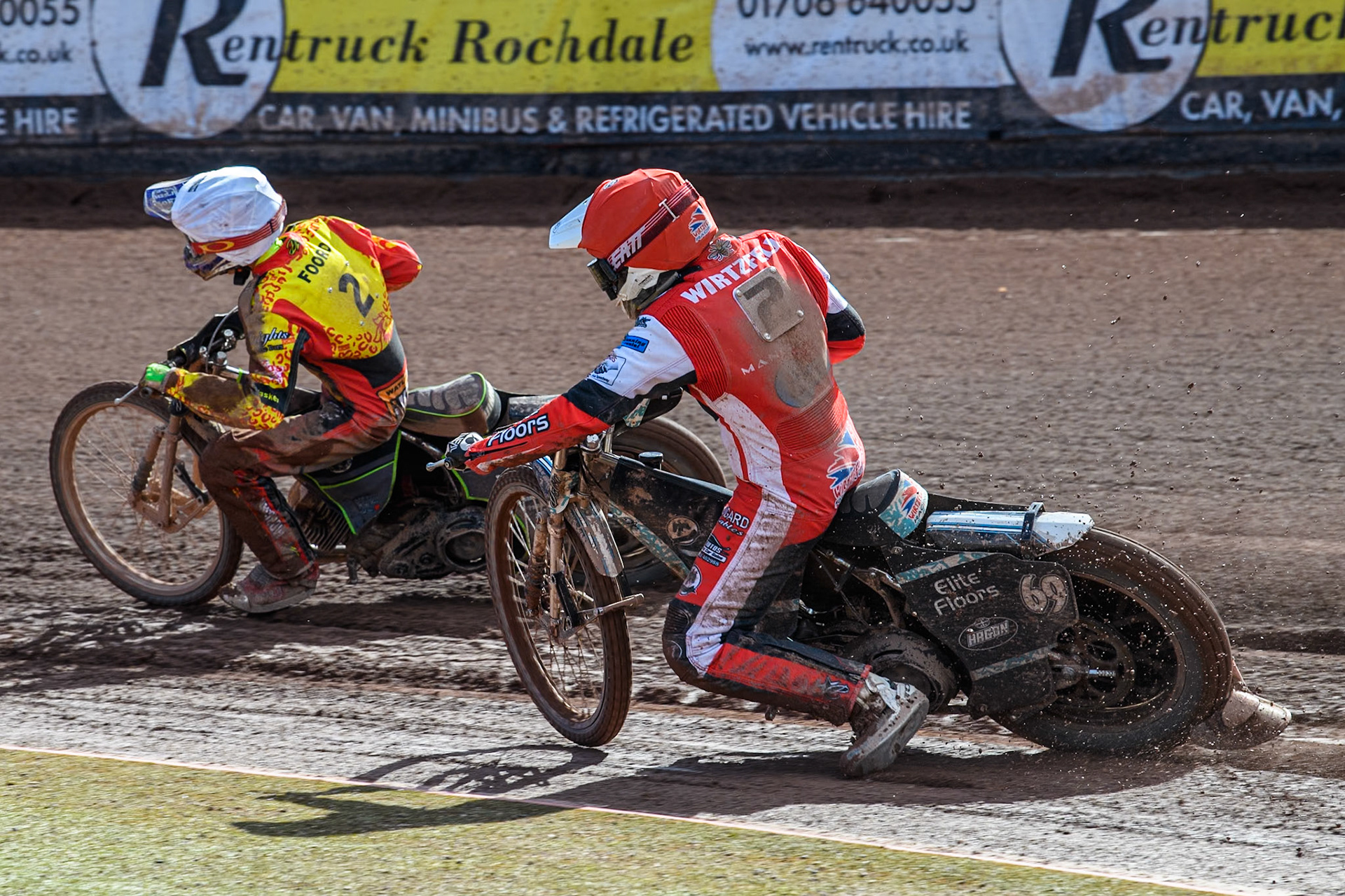 Belle Vue Colts' Chad Wirtzfeld (Red) chases Leicester Lion Cubs' Vinnie Foord (White) during the WSRA National Development League match between Belle Vue Colts and Leicester Lion Cubs at the National Speedway Stadium, Manchester on Friday 29th March 2024. (Photo: Ian Charles | MI News)