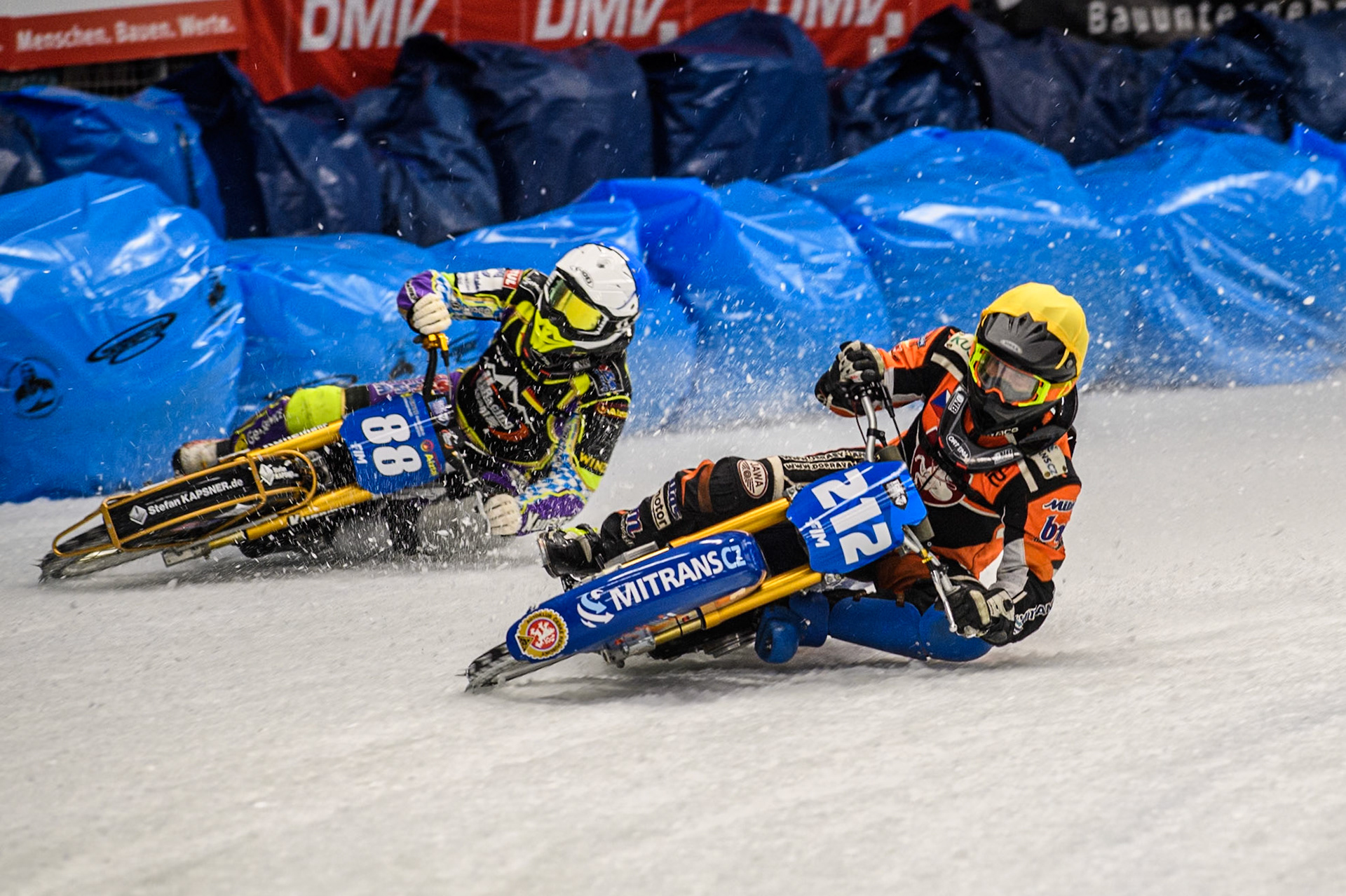 Lukas Hutla (212) of the Czech Republic in Yellow leading Max Niedermaier  (88) of Germany in Blue during the Ice Speedway Gladiators World Championship Final 1 at Max-Aicher-Arena, Inzell on Saturday 15th March 2025. (Photo: Ian Charles | MI News)