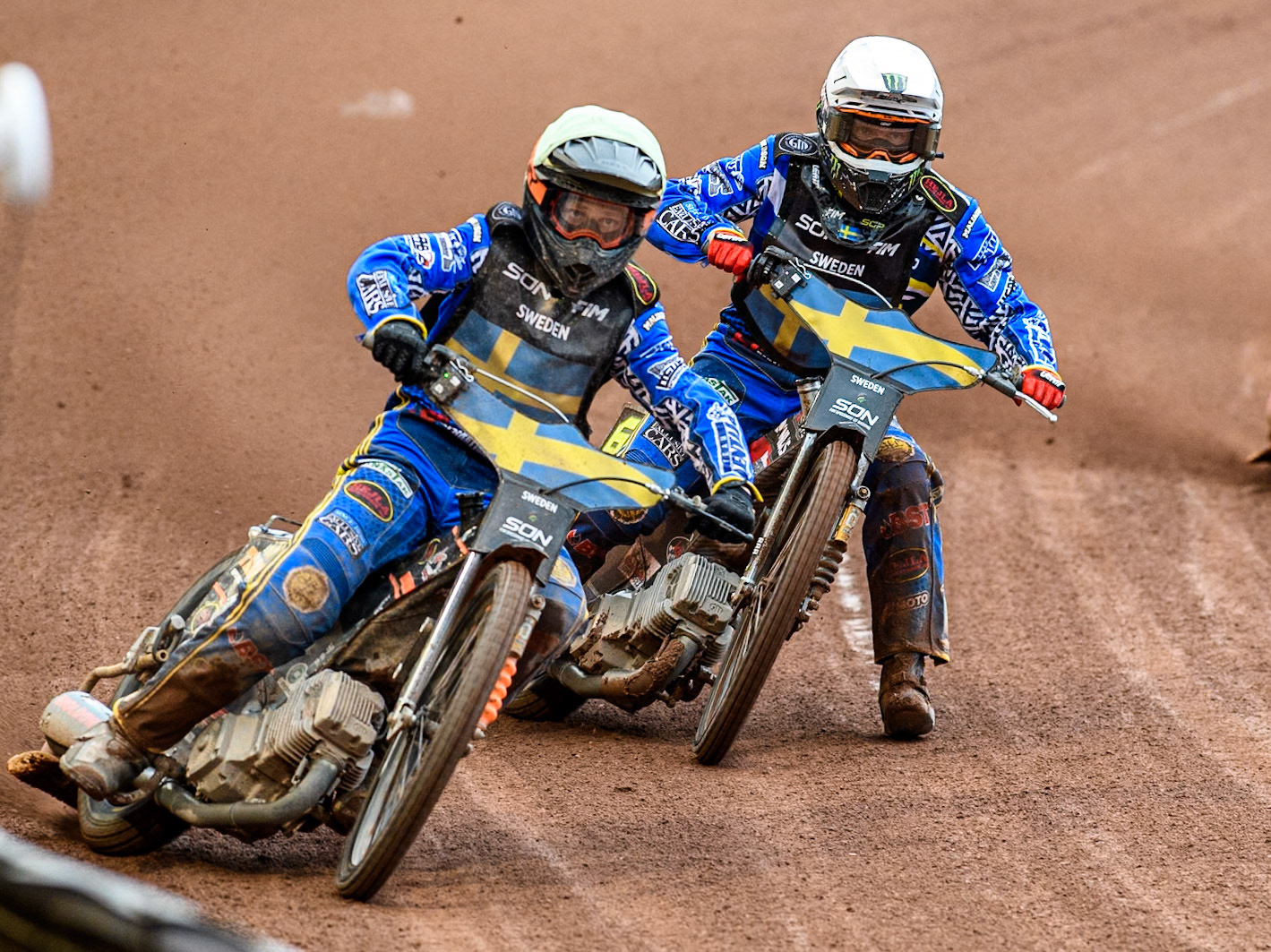 Jacob Thorssell of Sweden in Yellow leading team mate Fredrik Lindgren of Sweden in White during the Monster Energy FIM Speedway of Nations Semi-Final 1 at the National Speedway Stadium, Manchester on Tuesday 9th July 2024. (Photo: Ian Charles | MI News)
