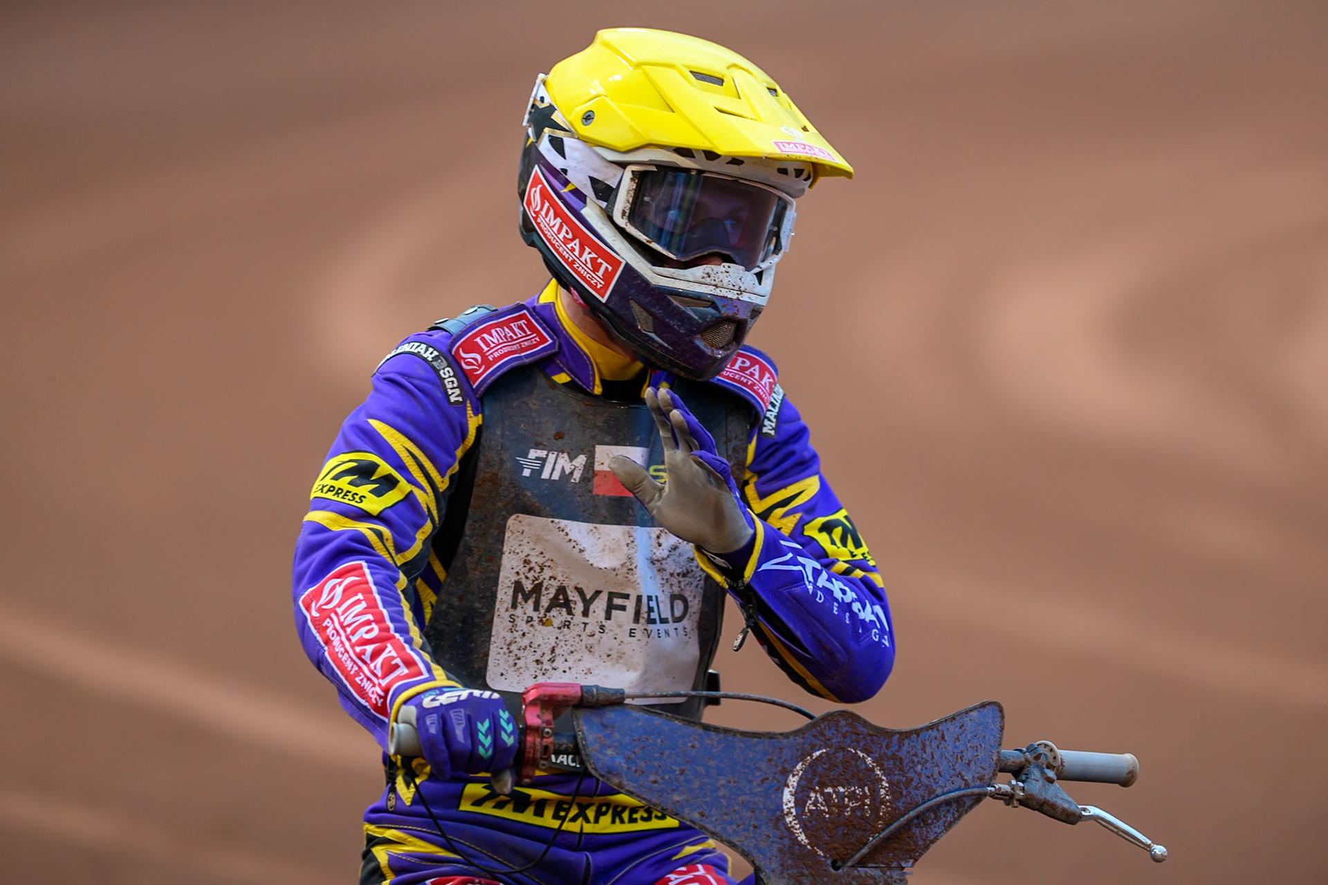 Kacper Woryna (223) of Poland waves to fans after his final heat of the meeting during the ATPI  FIM Speedway GP of Manchester at the National Speedway Stadium, Manchester on Saturday 6th June 2026. (Photo: Ian Charles | MI News)