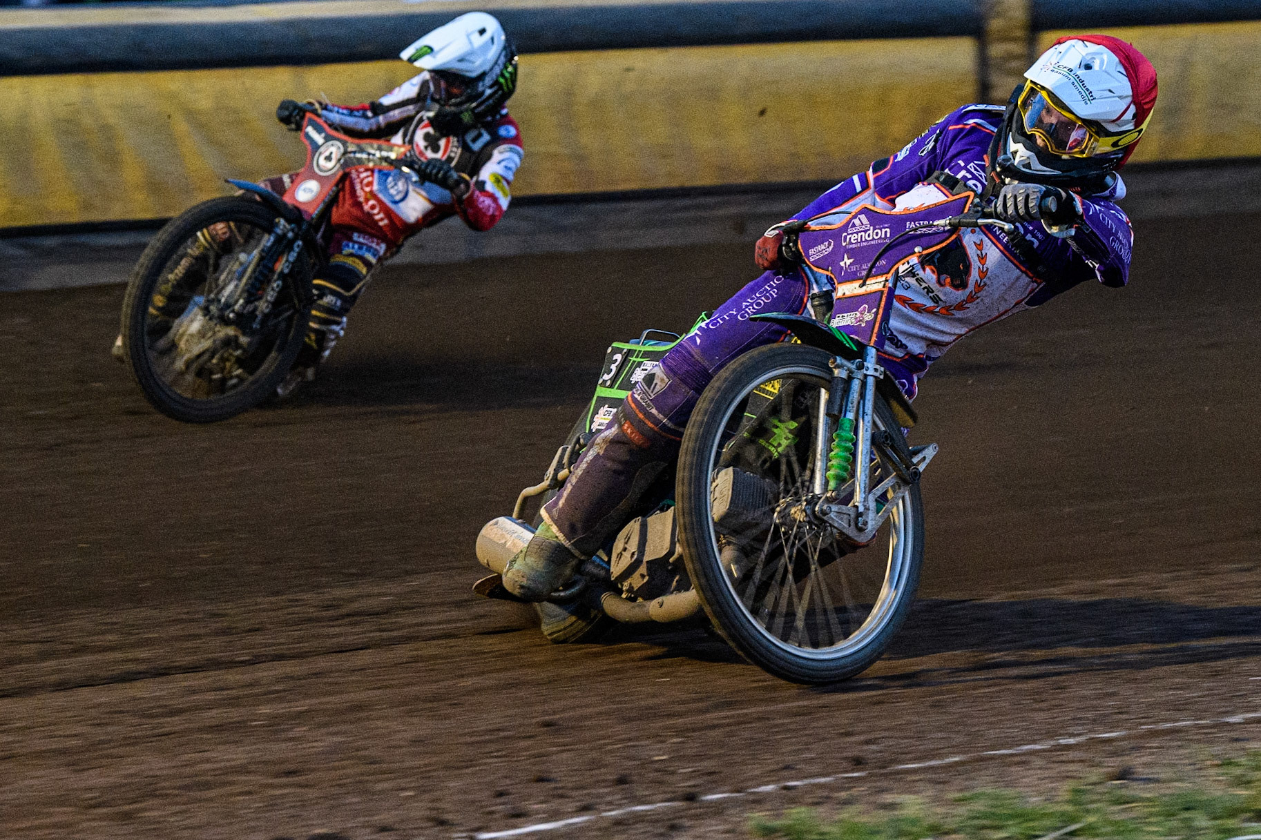 Benjamin Basso (Red) inside Dan Bewley (White) during the Sports Insure Premiership match between Peterborough and Belle Vue Aces at East of England Showground, Peterborough on Monday 26th June 2023. (Photo: Ian Charles | MI News)