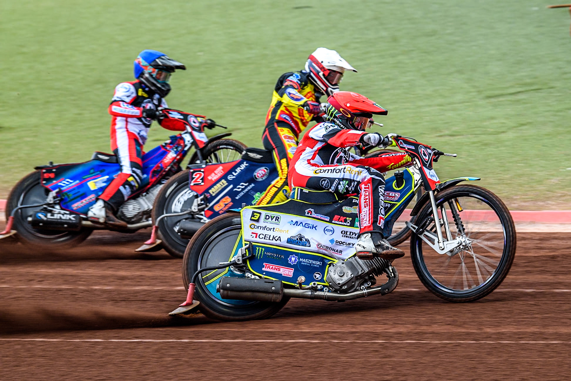 Belle Vue Aces' Jaimon Lidsey  in Red rides outside Birmingham Brummies' Steve Worrall  in White and Belle Vue Aces' Ben Cook  in Blue during the Rowe Motor Oil Premiership match between Belle Vue Aces and Birmingham Brummies at the National Speedway Stadium, Manchester on Monday 6th May 2024. (Photo: Ian Charles | MI News)