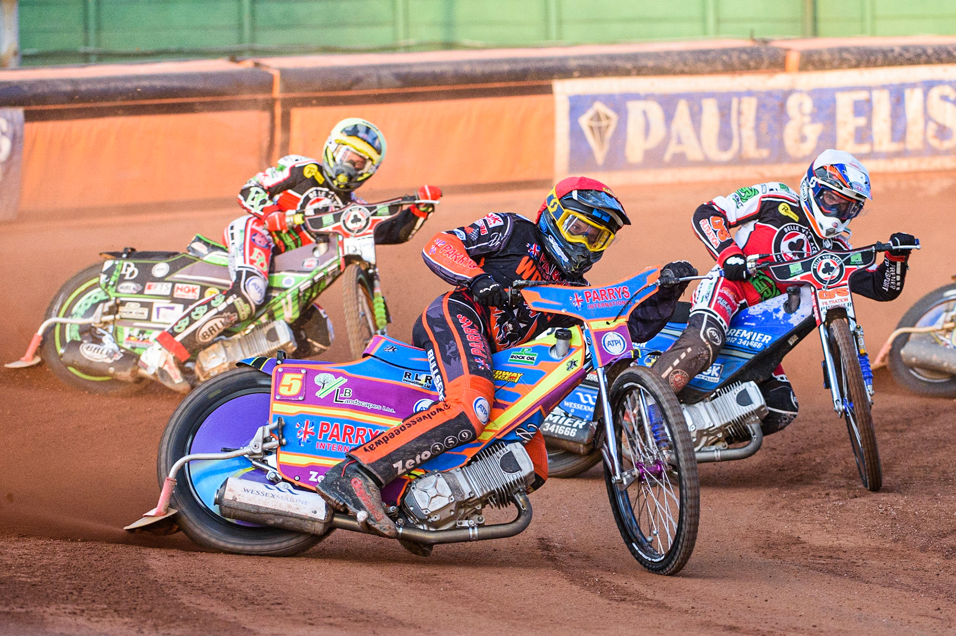 WOLVERHAMPTON, UK. JULY 26TH  Rory Schlein  (Red) leads Steve Worrall  (White) and Charles Wright  (Yellow) during the SGB Premiership match between Wolverhampton Wolves and Belle Vue Aces at the Ladbroke Stadium, Wolverhampton on Monday 26th July 2021. (Credit: Ian Charles | MI News)
