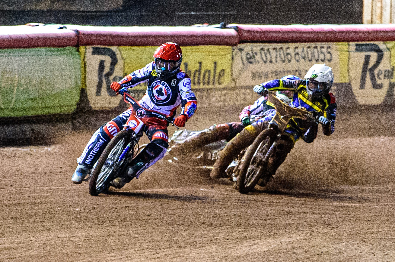 Jack Holder  (White) collides with Charles Wright  (Blue) behind Matej Zagar  (Red) during the SGB Premiership Grand Final 1st leg between Belle Vue Aces and Sheffield Tigers at the National Speedway Stadium, Manchester on Monday 10th October 2022. (Credit: Ian Charles | MI News)