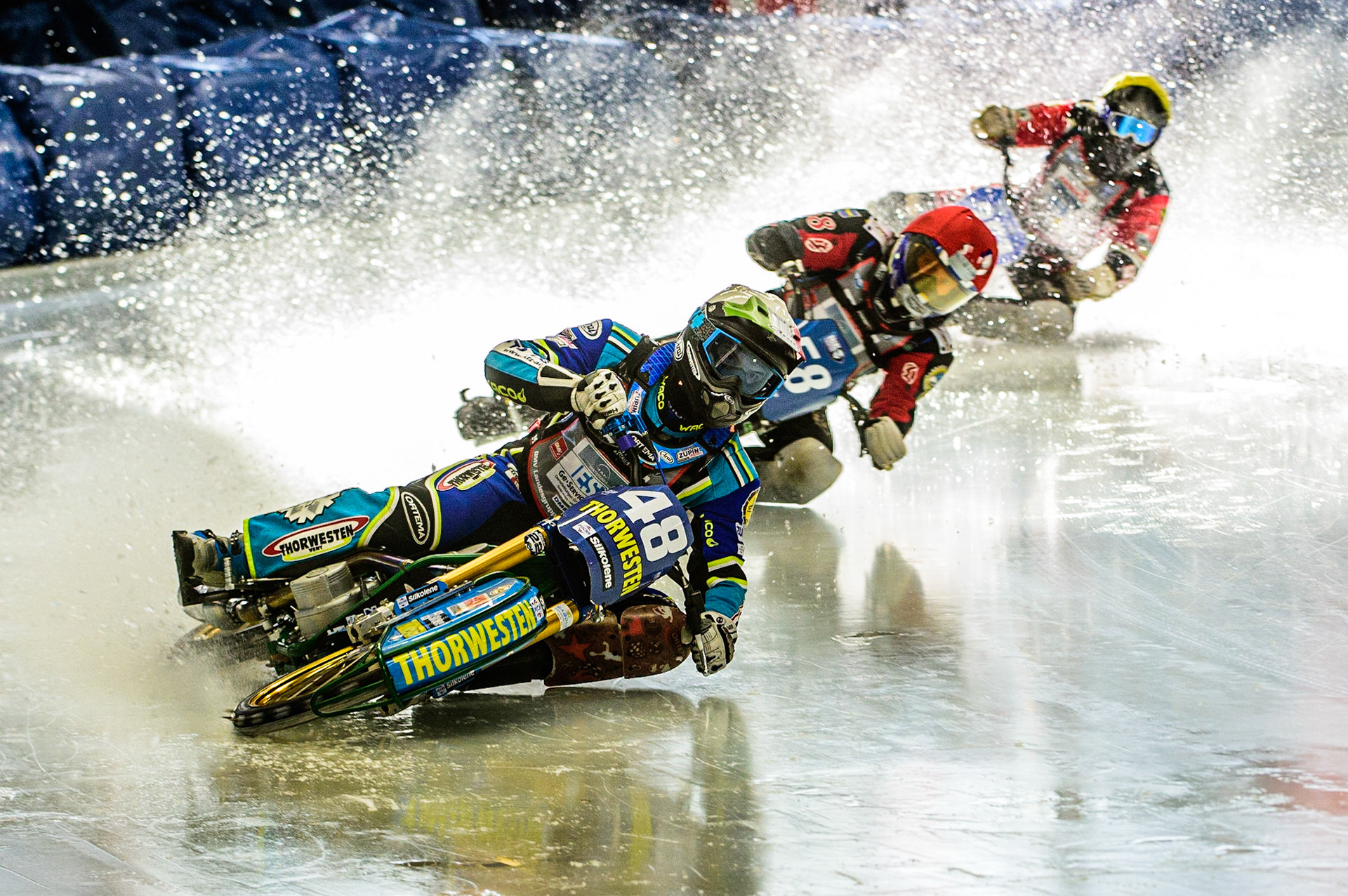 Luca Bauer (48) (White) leads Stefan Svensson (58) (Blue) and Harald Simon (50) (Yellow) during the Ice Speedway Gladiators World Championship Final 1 at Max-Aicher-Arena, Inzell, Germany on Saturday 18th March 2023. (Photo: Ian Charles | MI News)