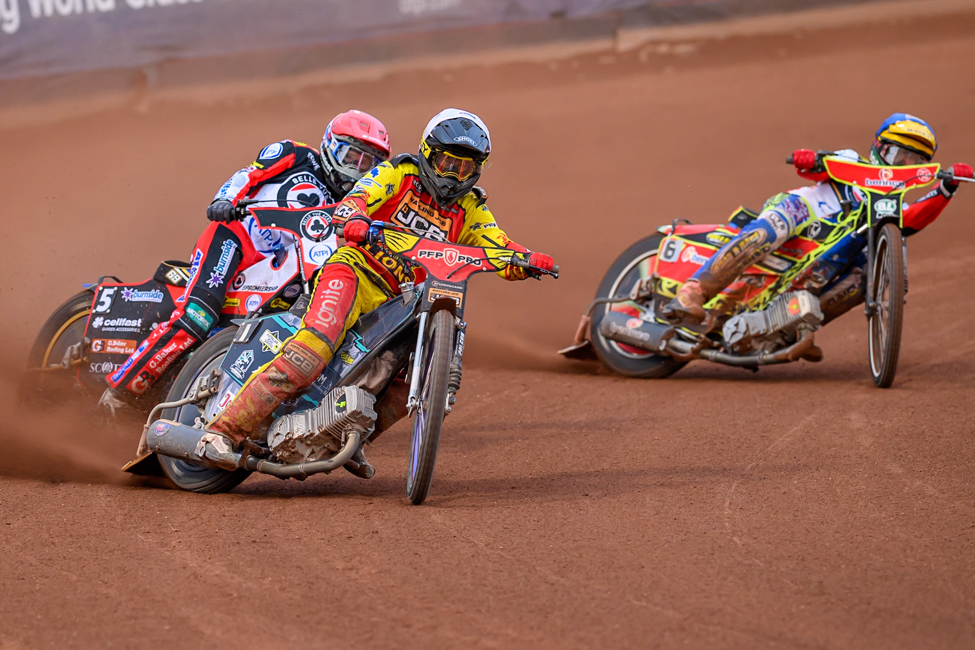 Ryan Douglas of Leicester Lions in White leading Jason Doyle of Belle Vue Aces in Red  and Mitch McDiarmid, Guest Rider for Belle Vue Aces in Blue  during the Rowe Motor Oil Premiership match between Belle Vue Aces and Leicester Lions at the National Speedway Stadium, Manchester on Monday 3rd August 2026. (Photo: Ian Charles | MI News)