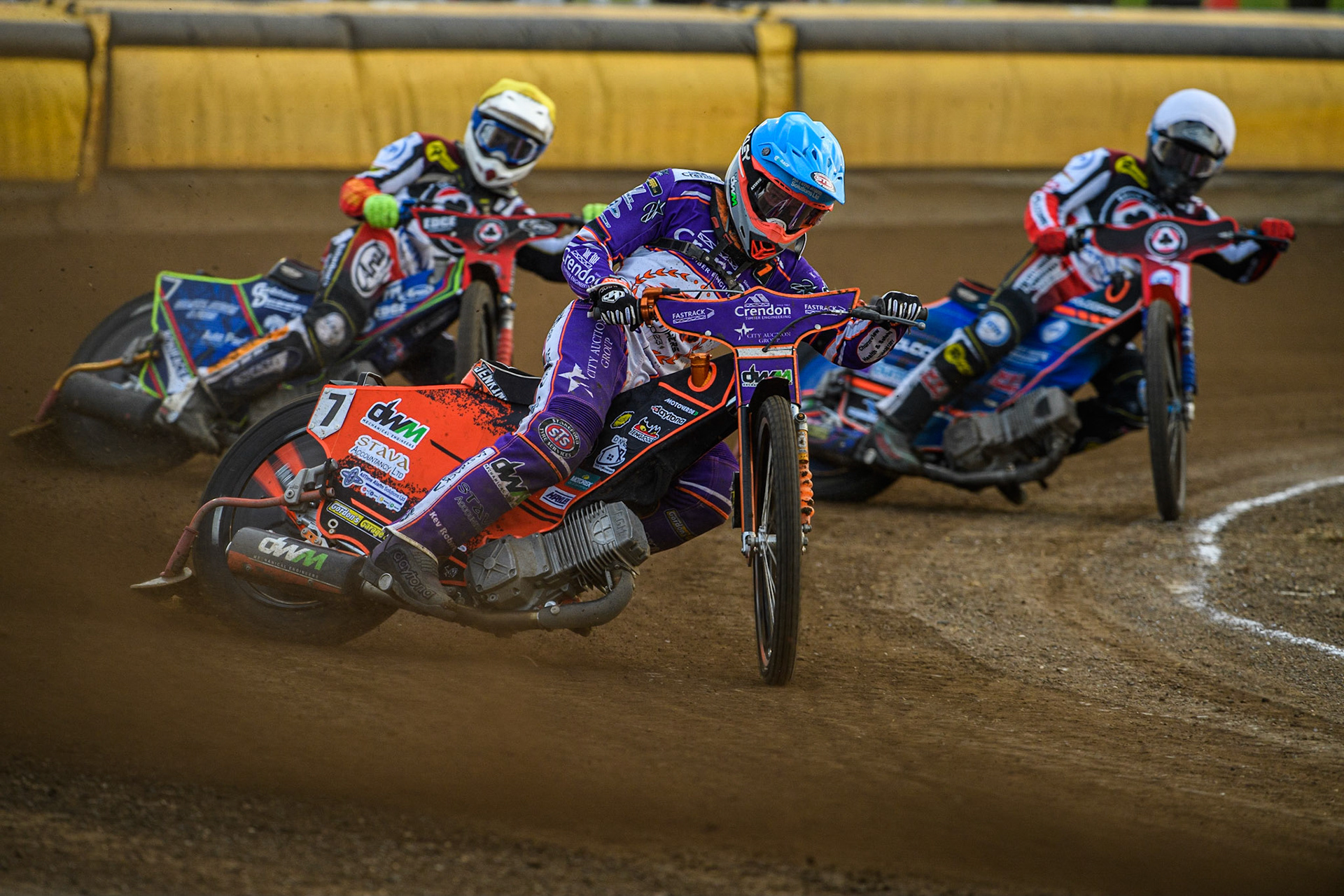 Jordan Jenkins (Blue) leads Jake Mulford  (Yellow) and Brady Kurtz (Red) during the Sports Insure Premiership match between Peterborough and Belle Vue Aces at East of England Showground, Peterborough on Monday 26th June 2023. (Photo: Ian Charles | MI News)