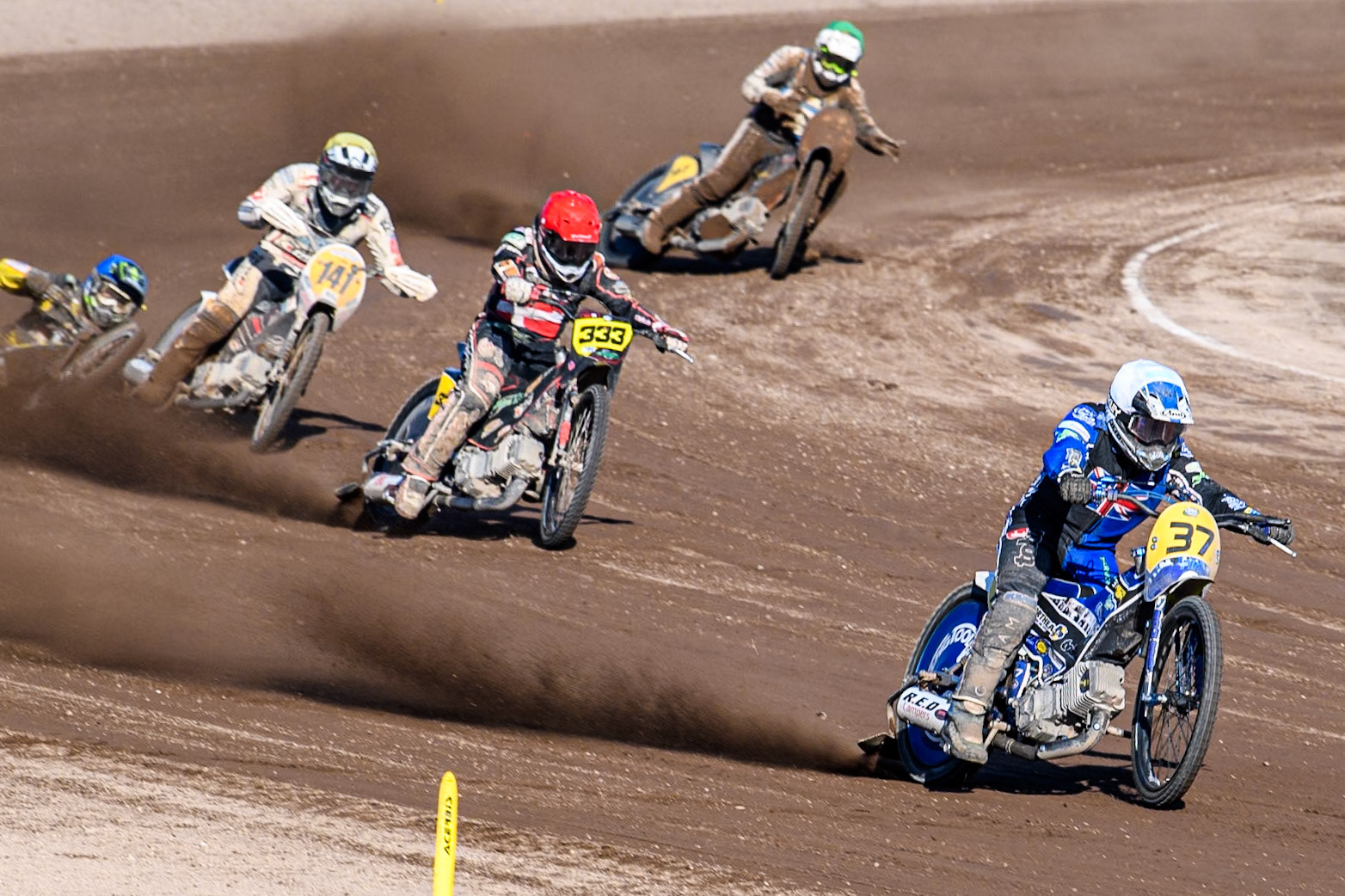 Chris Harris (37)of Great Britain in White leading Kenneth Kruse Hansen (333) of Denmark in Red and Andrew Appleton (141) of Great Britain in Yellow as Mika Meijer (54) of The Netherlands in Blue falls during the FIM Long Track World Championship Final 5 at the Speed Centre Roden, Roden, Netherlands on Sunday 22nd September 2024. (Photo: Ian Charles | MI News)