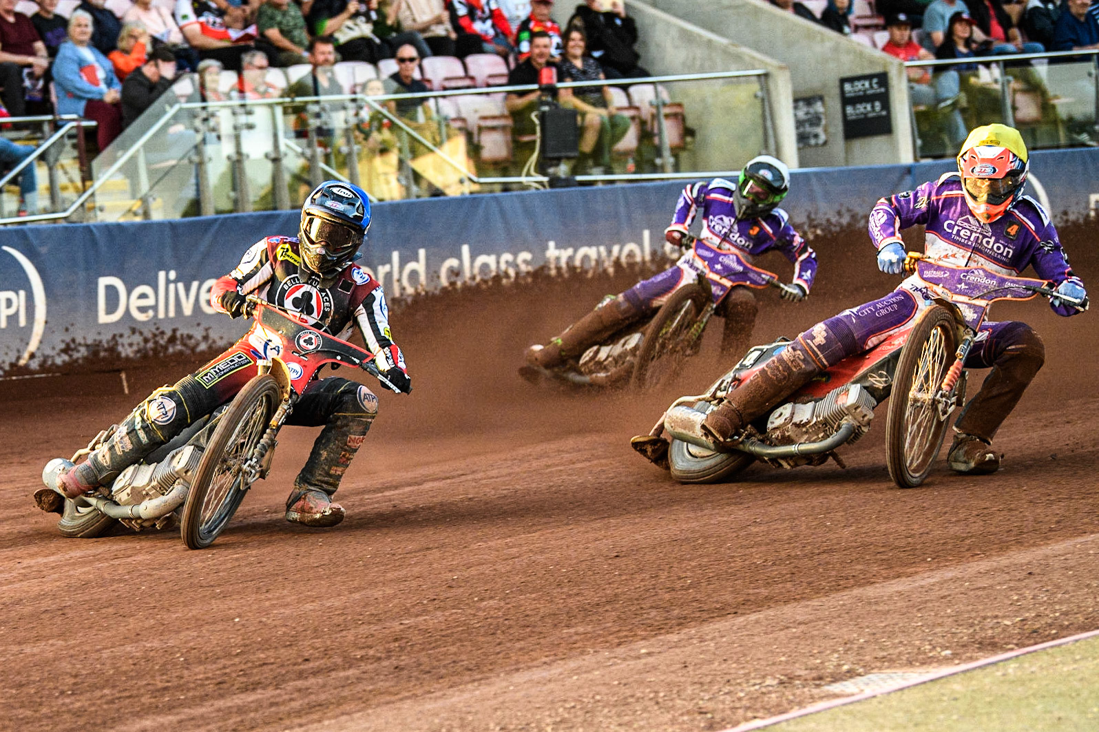 Tom Brennan (Blue) leads Richie Worrall (Yellow) and Benjamin Basso (White) during the Sports Insure Premiership match between Belle Vue Aces and Peterborough at the National Speedway Stadium, Manchester on Monday 19th June 2023. (Photo: Ian Charles | MI News)