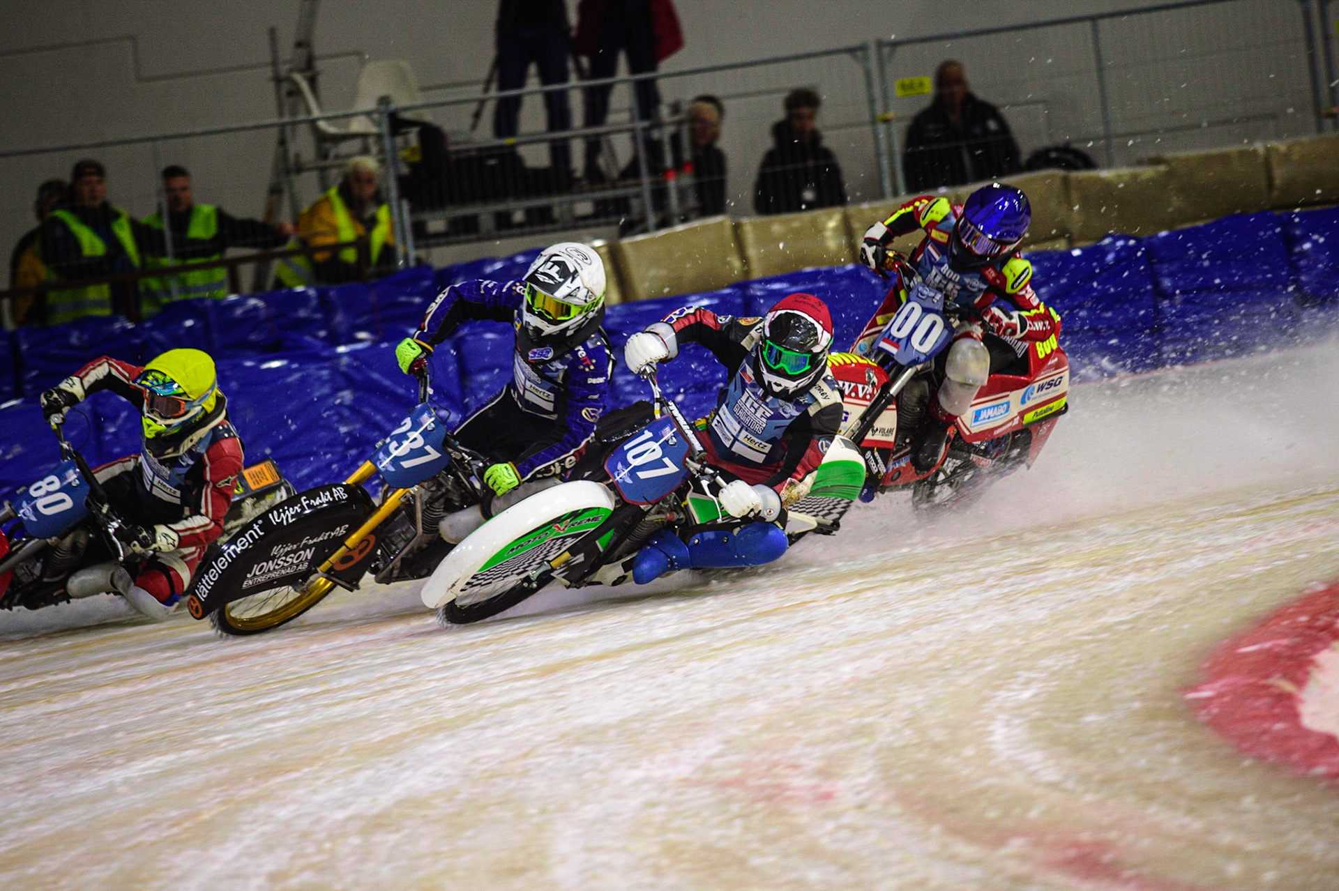 HEERENVEEN, NL. Jasper Iwema (800) (Blue) gets into some difficulty behind Andrej Divis (107) (Red) Jimmy Hörrnell (237)  (White) and Jiri Wildt (80) (Yellow)  during the FIM Ice Speedway Gladiators World Championship Final 4 at Ice Rink Thialf, Heerenveen on Sunday  3 April 2022. (Credit: Ian Charles | MI News)