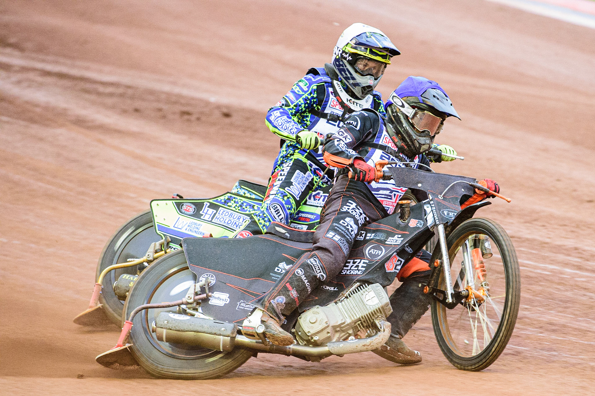 Meeting reserve Jack Smith (Blue) passes Paul Starke  (White) during the Sports Insure British Speedway Championship Final at the National Speedway Stadium, Bellevue, Manchester, England on Monday 1st August 2022. (Photo by: Ian Charles | MI News)