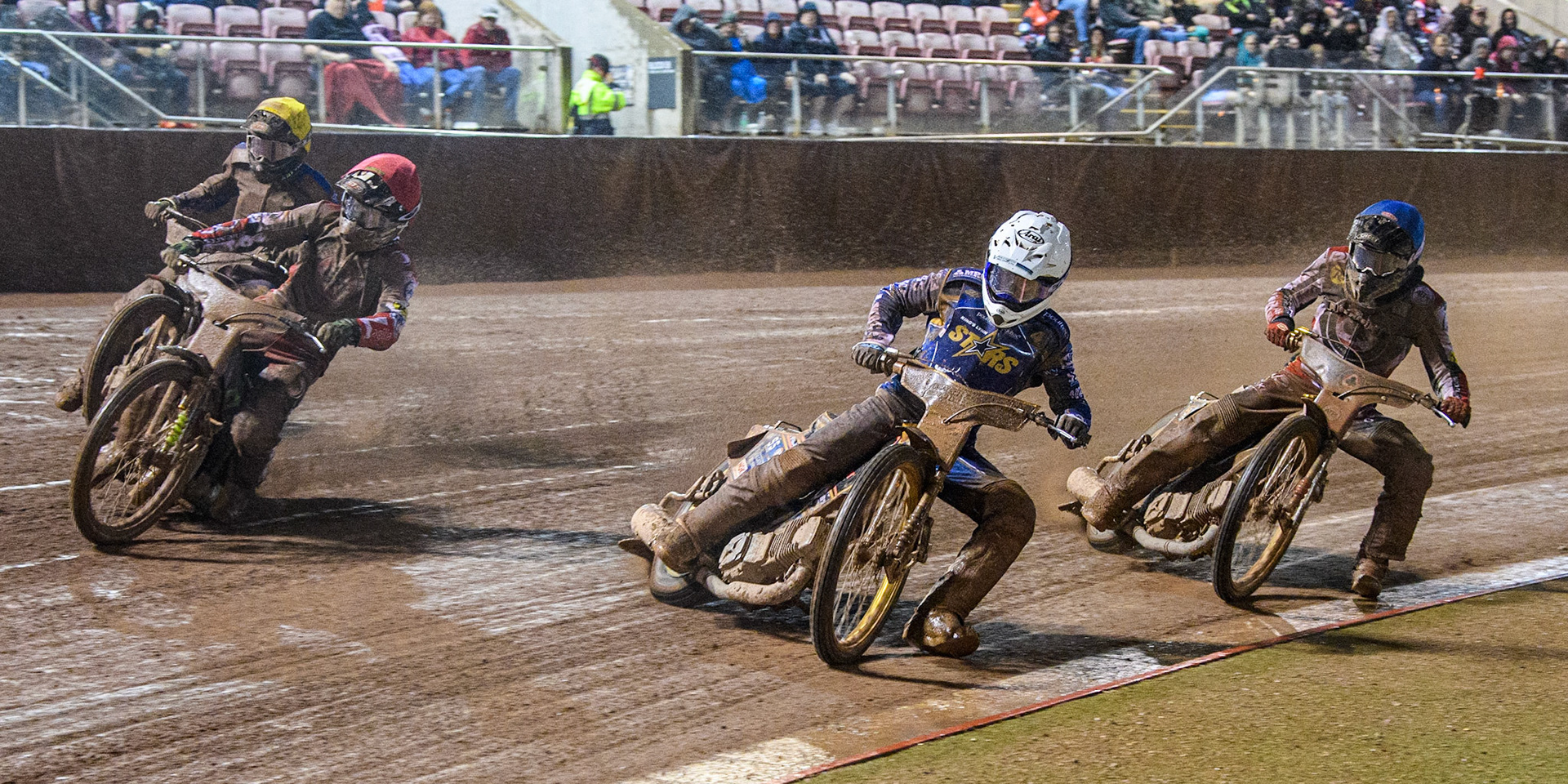 Connor Mountain (White) inside Charles Wright (Red) with Simon Lambert (Yellow) and Norick Blodorn (Blue) behind during the Sports Insure Premiership match between Belle Vue Aces and King's Lynn Stars at the National Speedway Stadium, Manchester on Monday 21st August 2023. (Photo: Ian Charles | MI News)