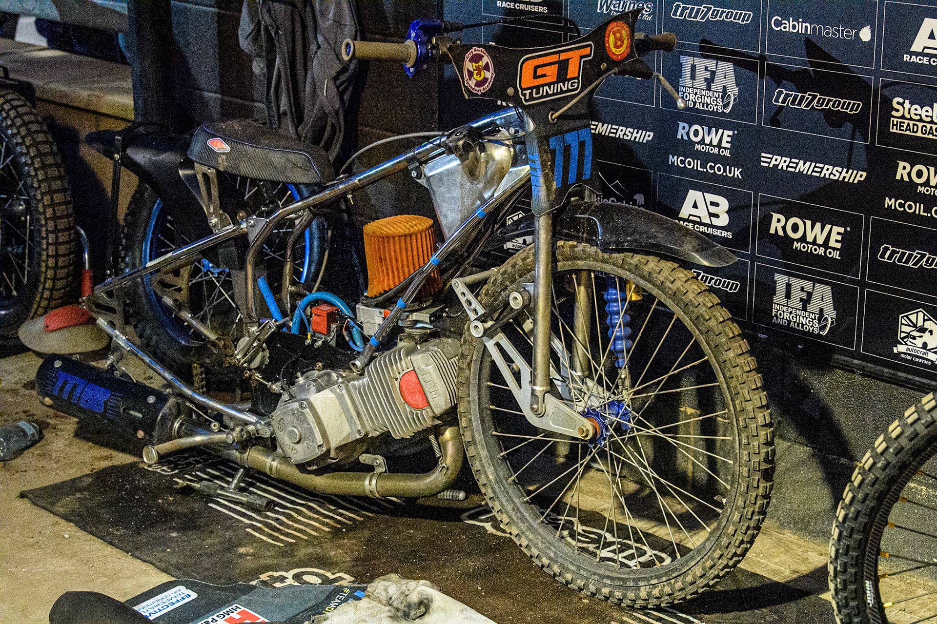 Budd’s main bike in the pits after his crash. The front forks ate bent backwards with the wheel touching the engine. Crash happened in Heat 6  during the WSRA National Development League match between Steelers and Belle Vue Colts at Owlerton Stadium, Sheffield on Monday 5th May 2025. (Photo: Ian Charles | MI News)