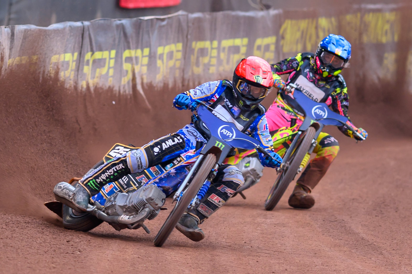 Jack Holder (25) of Australia in Red leading Michael Jepsen Jensen (52) of Denmark in Blue during the ATPI  FIM Speedway GP of Manchester at the National Speedway Stadium, Manchester on Saturday 6th June 2026. (Photo: Ian Charles | MI News)
