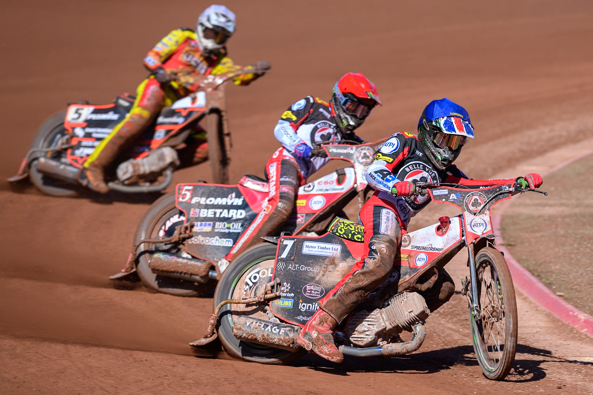 William Cairns of Belle Vue Aces  in Blue leading Dan Bewley  of Belle Vue Aces  in Red and Sam Masters of Leicester Lions  in White during the Knockout Cup Northern Section match between Belle Vue Aces and Leicester Lions at the National Speedway Stadium, Manchester on Monday 6th April 2026. (Photo: Ian Charles | MI News)