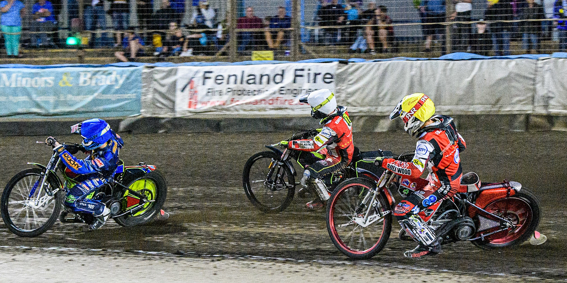 Connor Bailey (Yellow) and Tom Brennan (White) chase Anders Rowe  (Blue) during the Sports Insure Premiership match between King's Lynn Stars and Belle Vue Aces at the Adrian Flux Arena, King's Lynn on Thursday 24th August 2023. (Photo: Ian Charles | MI News)