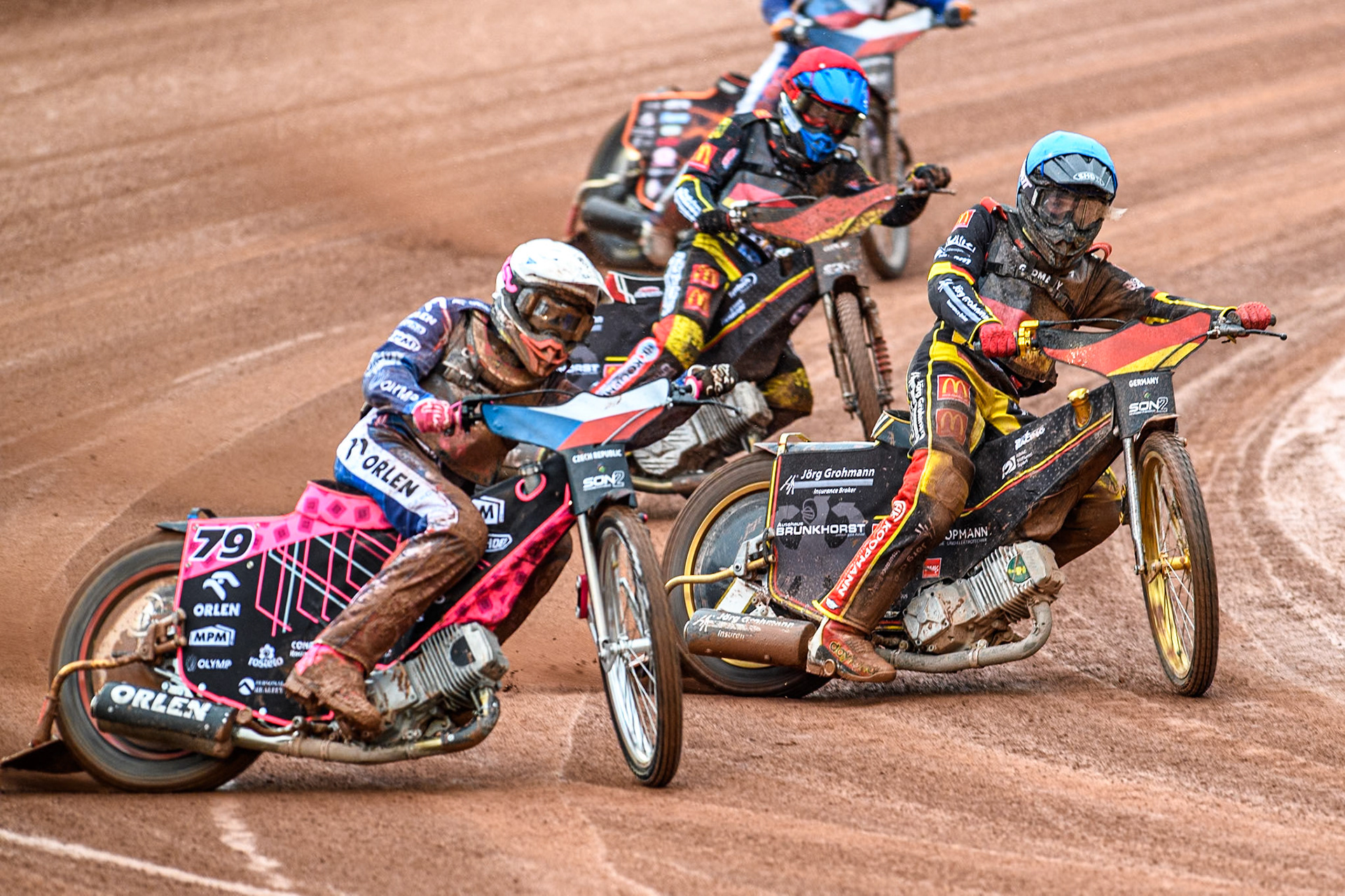 Adam Bubba Bednar of Czech Republic in White leading Norick Blödorn of Germany in Blue and Patrick Hyjek of Germany in Red during the Monster Energy FIM Speedway of Nations 2 (Under 21) Final at the National Speedway Stadium, Manchester on Friday 12th July 2024. (Photo: Ian Charles | MI News)