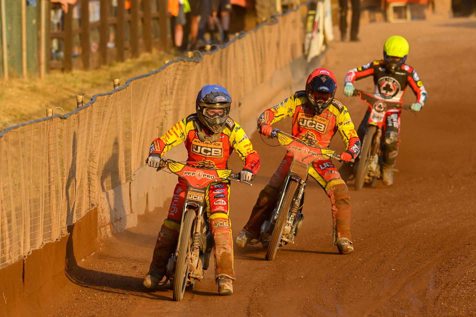 Dan Thompson of Leicester Lions  in Blue leading Ryan Douglas of Leicester Lions in Red and Tate Zischke of Belle Vue Aces in Yellow during the Rowe Motor Oil Premiership match between Leicester Lions and Belle Vue Aces at the Hydroscan Arena, Leicester on Thursday 23rd July 2026. (Photo: Ian Charles | MI News)