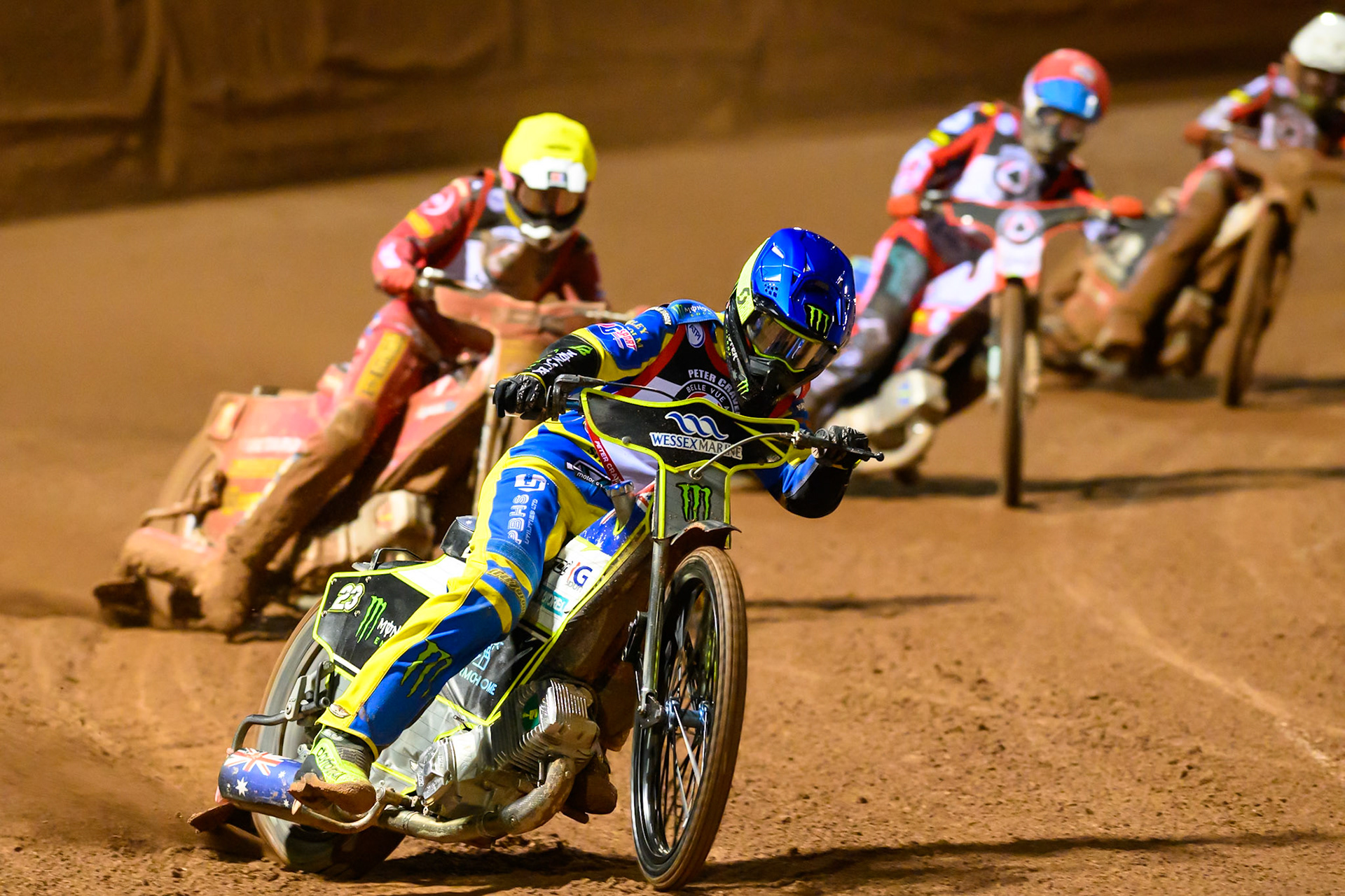 Chris Holder  in Blue leading Max Fricke in Yellow and Brady Kurtz  in White during the Peter Craven Memorial Trophy at the National Speedway Stadium, Manchester, on Monday 16th March 2026. (Photo: Ian Charles | MI News)