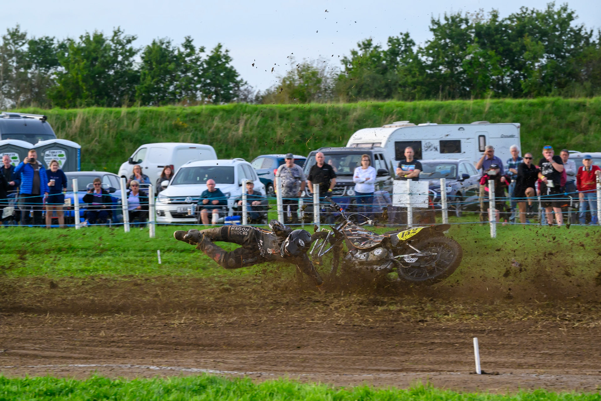 British Masters (Solos): Ashton Vale (152) catches the back wheel of Chris Harris (37)  and comes off during the British Masters Grasstrack Championship at Lower Marsh Farm, Much Hoole, Preston in Lancashire, England on Sunday 13th September 2026. (Photo: Ian Charles | MI News)