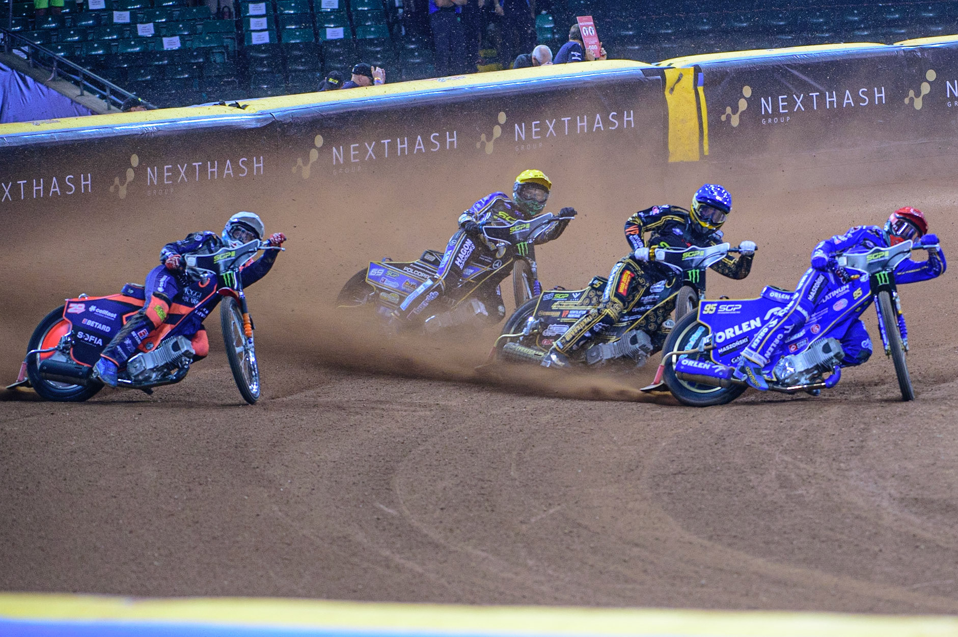 Bartosz Zmarzlik (95) (Red) leads Anders Thomsen (105) (Blue) Andžejs Ļebedevs (29) (White) and Jason Doyle (69) (Yellow) during the FIM  Speedway Grand Prix of Great Britain at the Principality Stadium, Cardiff on Saturday 13th August 2022. (Credit: Ian Charles | MI News