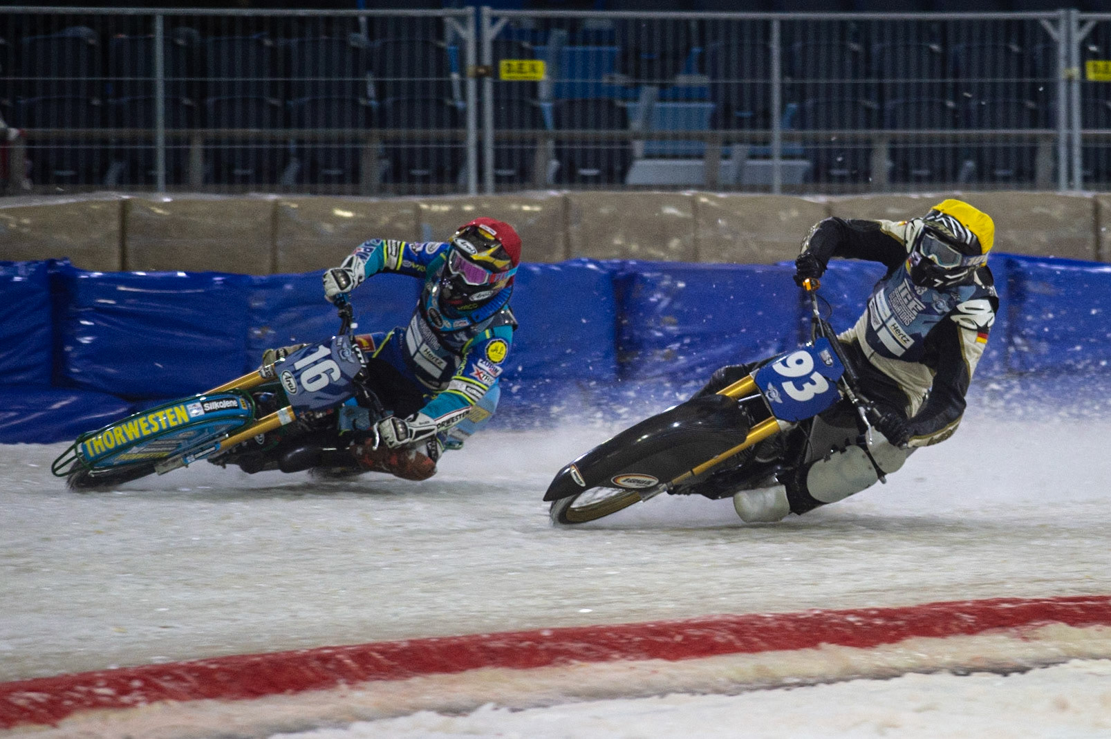 HEERENVEEN, NL. Franz Mayerbüchler (93) (Yellow) inside Luca Bauer (16) (Red) during the FIM Ice Speedway Gladiators World Championship Final 3 at Ice Rink Thialf, Heerenveen on Saturday  2 April 2022. (Credit: Ian Charles | MI News)