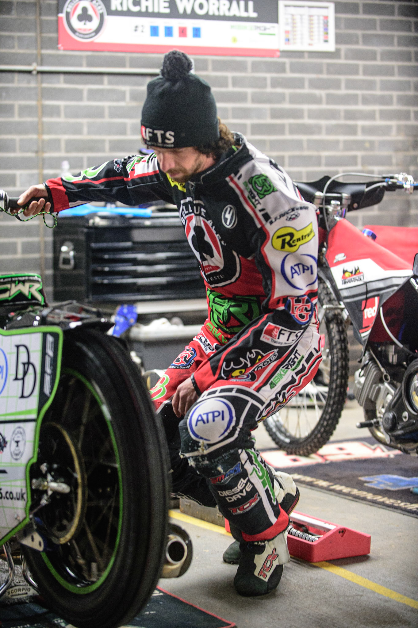 MANCHESTER, UK. OCT 11TH  Charles Wright  checks his bike during the SGB Premiership Grand Final 1st Leg between Belle Vue Aces and Peterborough Panthers at the National Speedway Stadium, Manchester on Monday 11th October 2021. (Credit: Ian Charles | MI News)