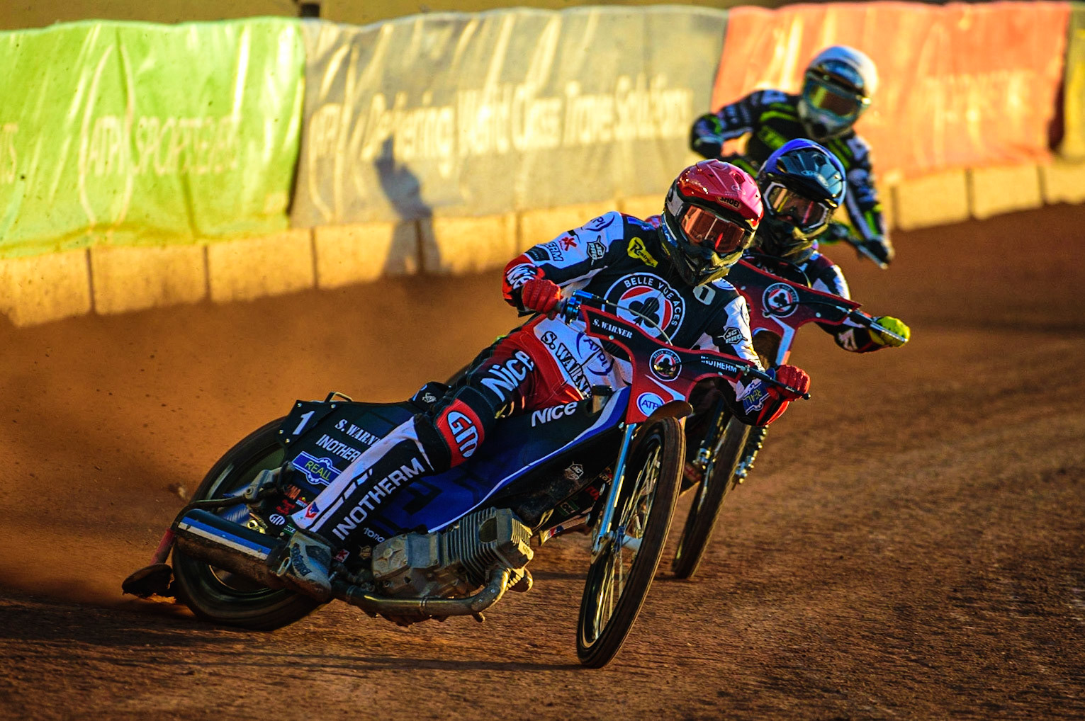 Matej Zagar  (Red) and Tom Brennan  (Blue) lead Troy Batchelor  (White) during the SGB Premiership match between Belle Vue Aces and Ipswich Witches at the National Speedway Stadium, Manchester on Monday 8th August 2022. (Credit: Ian Charles | MI News)