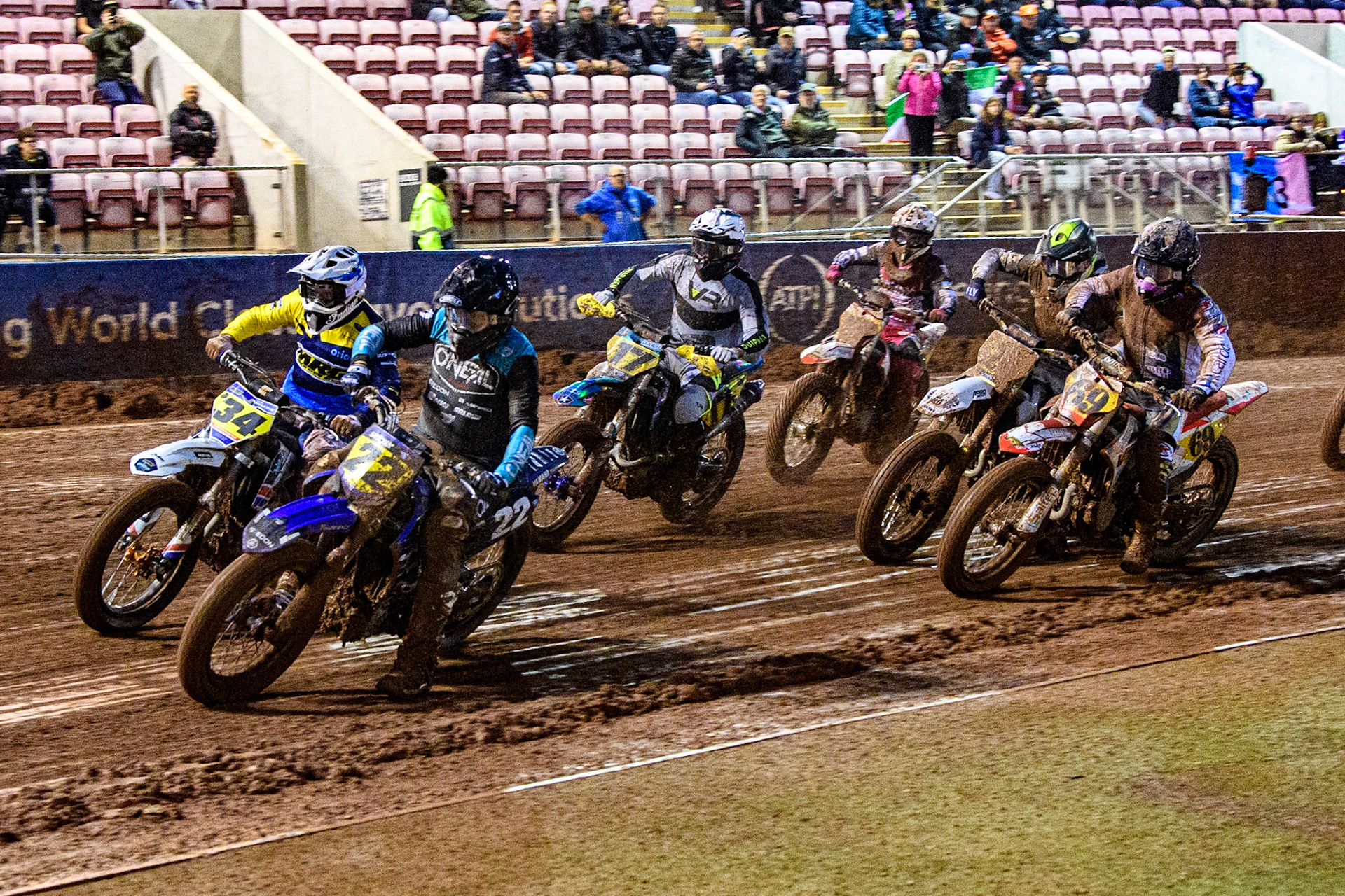 Ondřej Svědík (22) from Czech Rep. and Ervin Krajčovič (34) from Czech Rep. lead the pack to the first turn during the FIM World Flat Track Championship Round 1 at the National Speedway Stadium, Manchester on Saturday 5th August 2023. (Photo: Ian Charles | MI News)