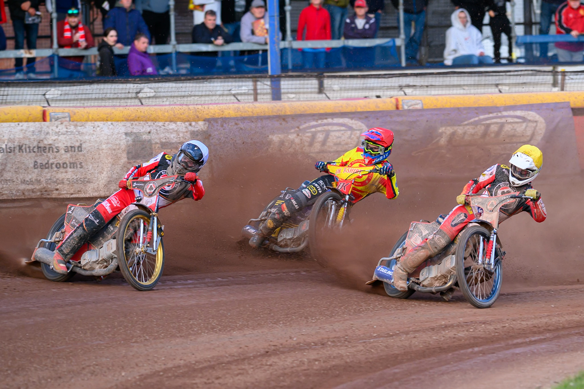 Belle Vue Aces' Norick Blodorn in White rides outside Birmingham Brummies' Paco Castagna in Red and Belle Vue Aces' Jake Mulford in Yellow during the Rowe Motor Oil Premiership match between Birmingham Brummies and Belle Vue Aces at Perry Bar Stadium, Birmingham on Monday 2nd June 2025. (Photo: Ian Charles | MI News)