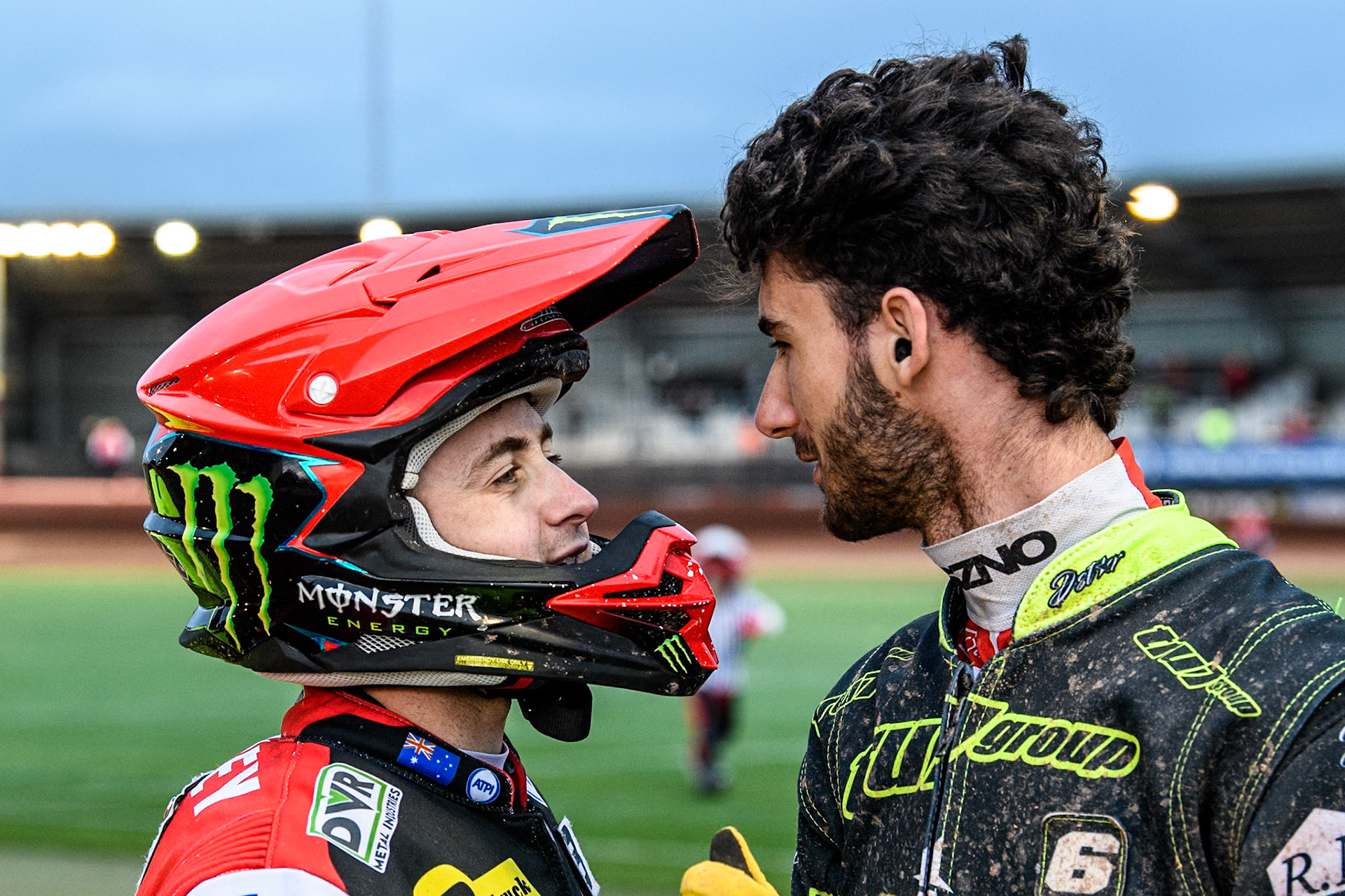 Belle Vue Aces' Jaimon Lidsey  (Left) and Ipswich Witches' Keynan Rew share a joke during the Rowe Motor Oil Premiership match between Belle Vue Aces and Ipswich Witches at the National Speedway Stadium, Manchester on Monday 1st July 2024. (Photo: Ian Charles | MI News)