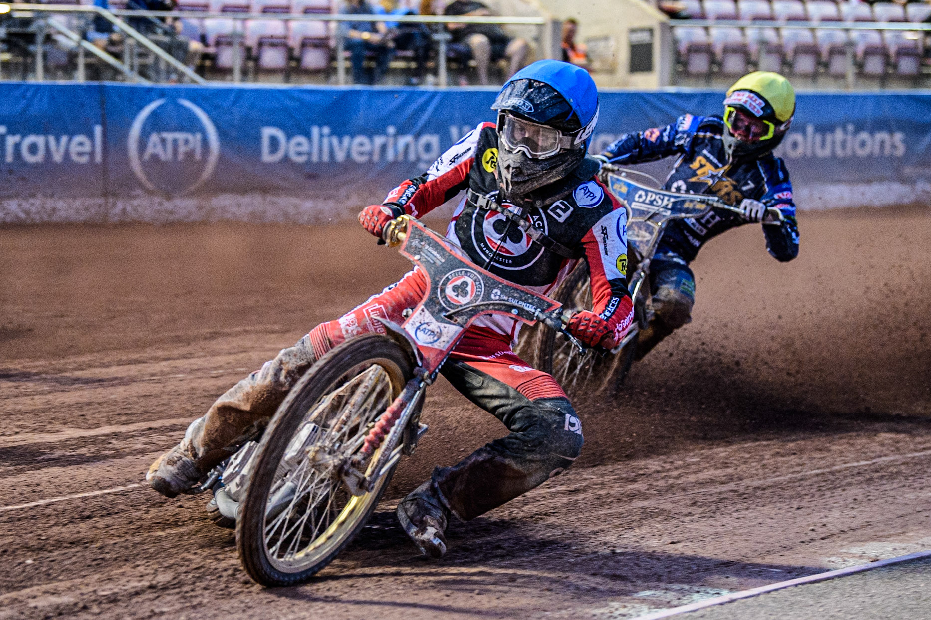 Belle Vue Aces' Norick Blodorn  in Blue leading Kings Lynn Stars' Anders Rowe  in Yellow during the Rowe Motor Oil Premiership match between Belle Vue Aces and King's Lynn Stars at the National Speedway Stadium, Manchester on Monday 12th August 2024. (Photo: Ian Charles | MI News)